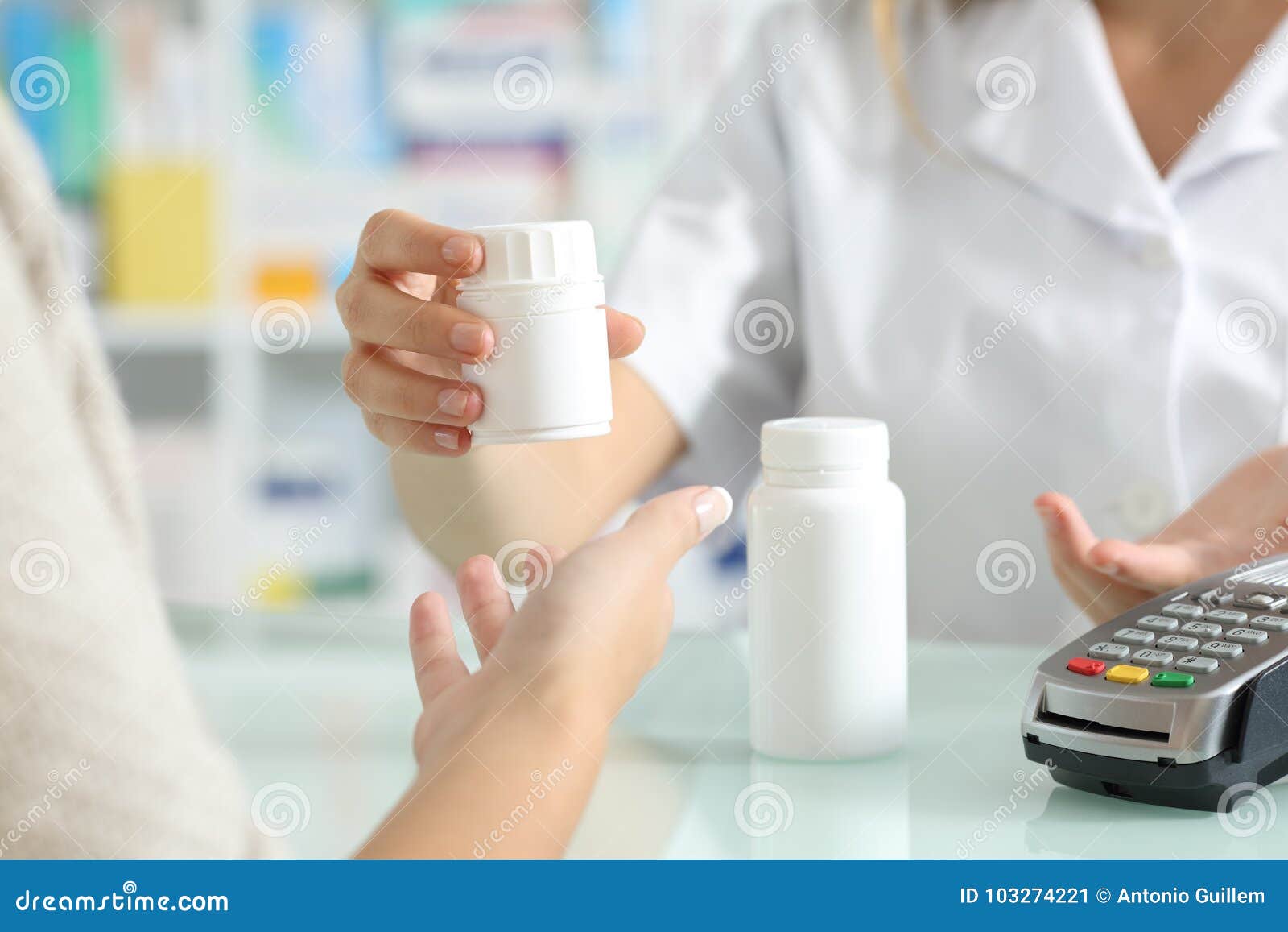 pharmacist selling medicines to a customer