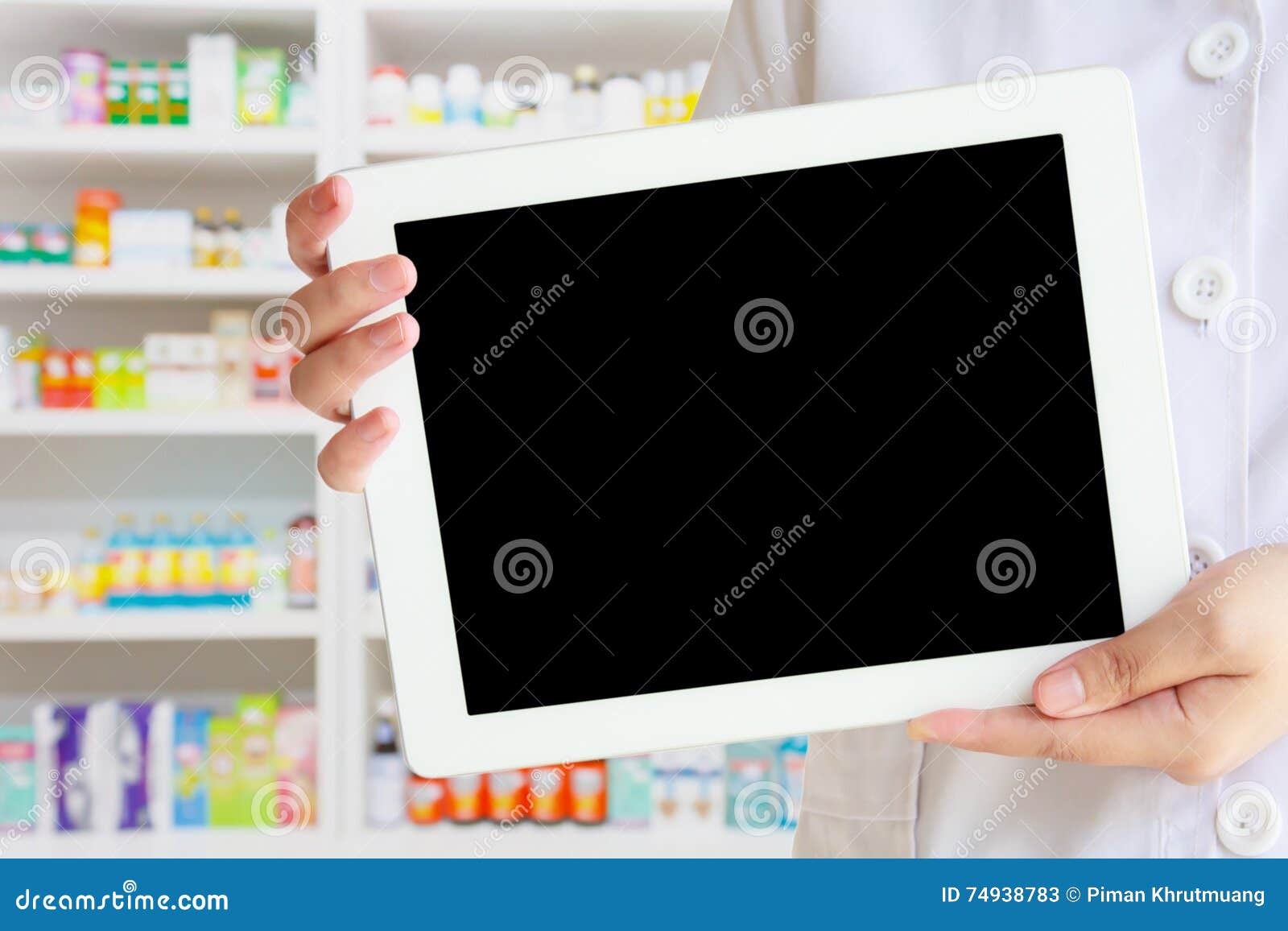 Pharmacist Showing Tablet Computer in the Pharmacy Stock Image Image