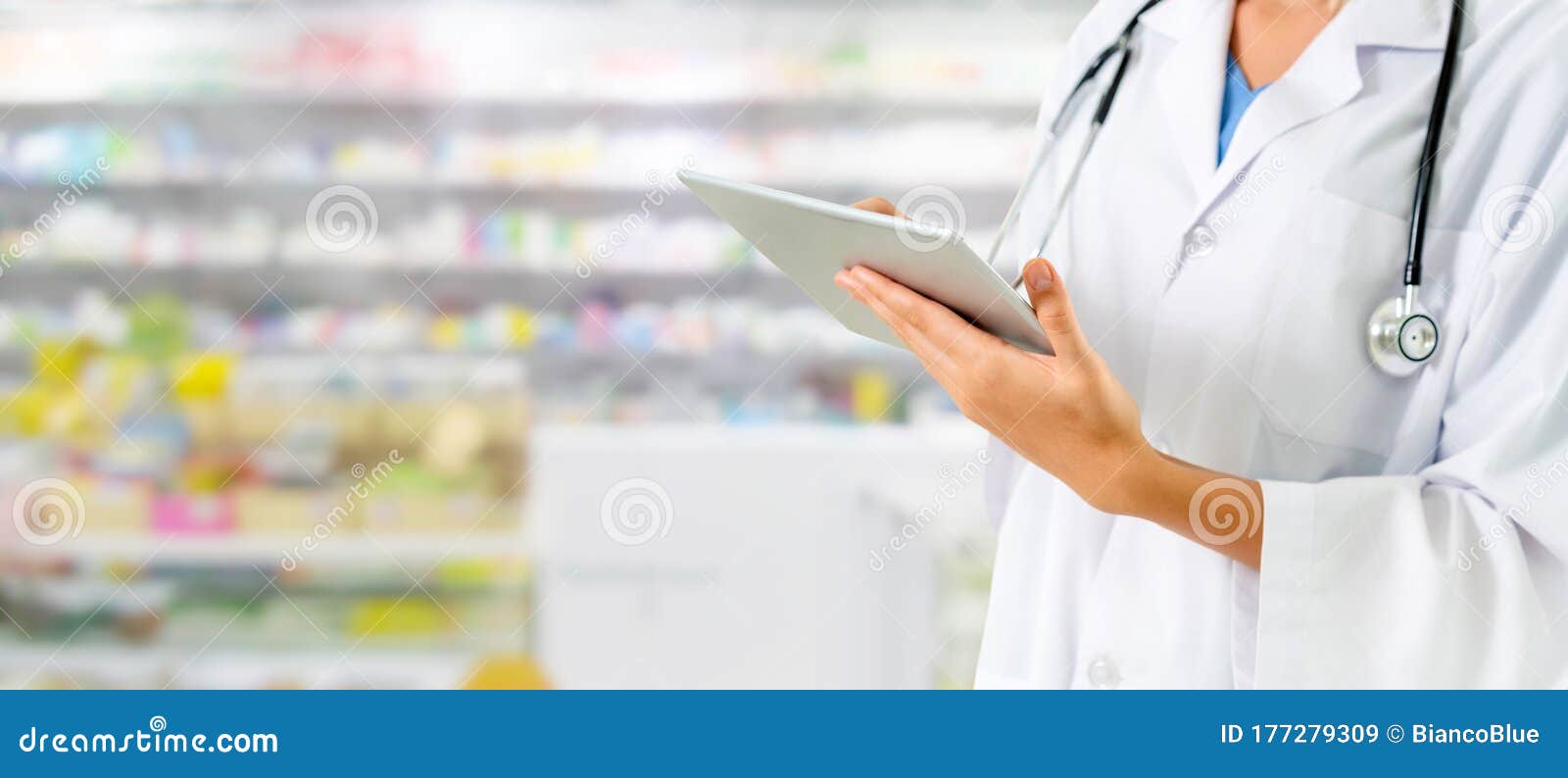Pharmacist Using Tablet Computer at Pharmacy Stock Image Image of