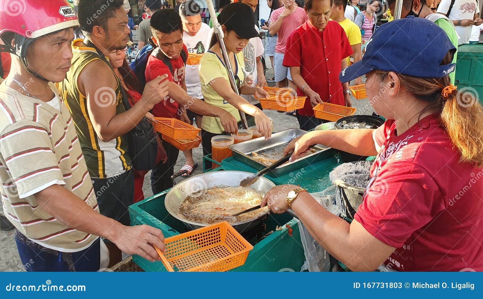 Philippine Street Vendor Sells Fried Chicken At Night Editorial Photo