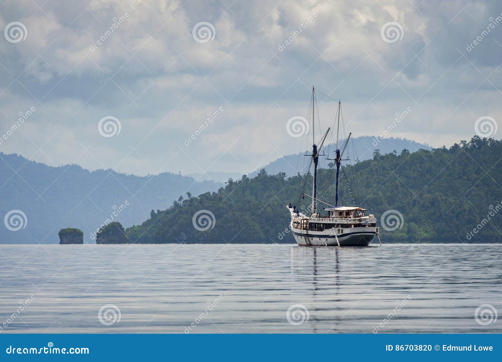 phinisi schooner anchored in raja ampat, indonesia