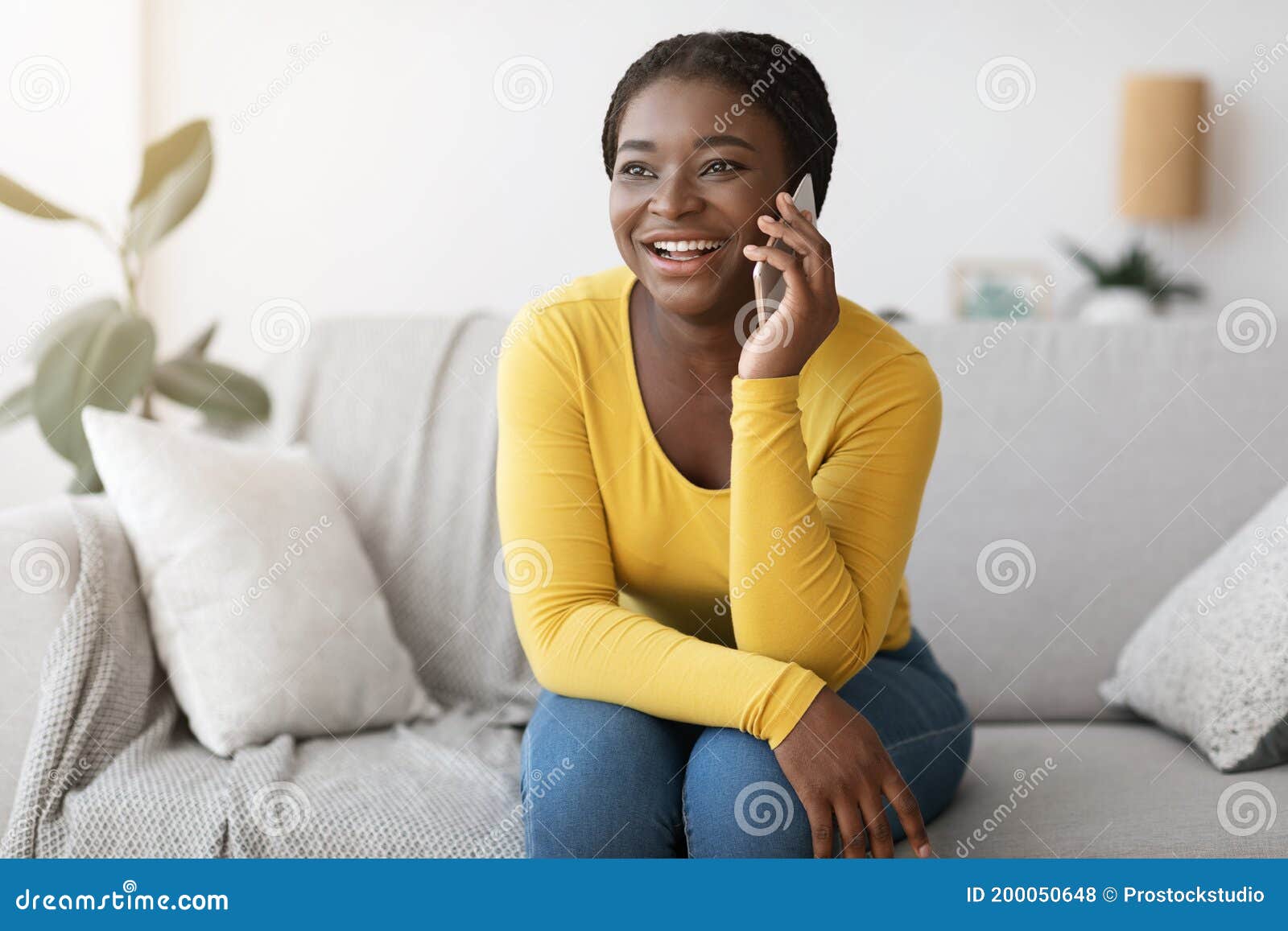 Phone Call. Joyful Young African American Woman Talking on Cellphone at