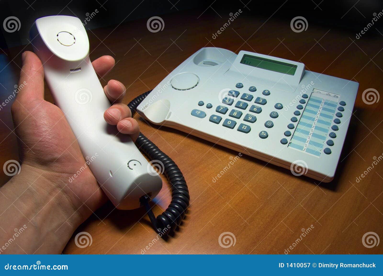 Phone handset in hand stock image. Image of industrial 1410057
