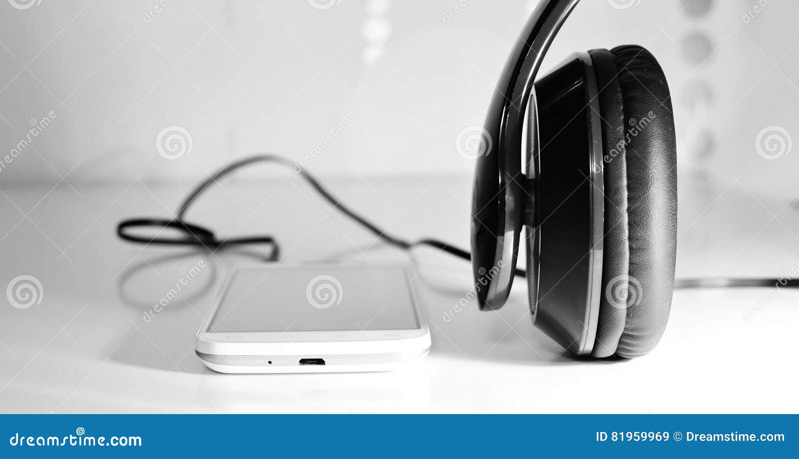 Phone with headphones stock image. Image of music, technology 81959969