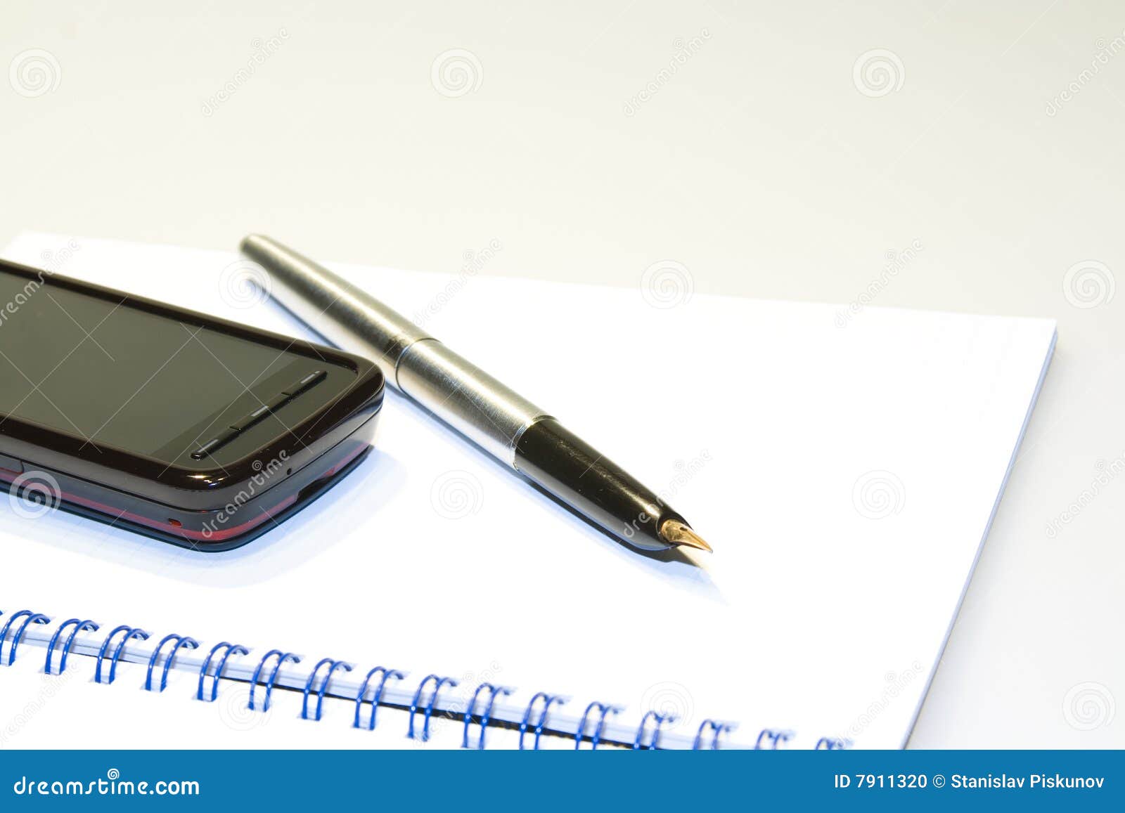 Phone on notebook stock photo. Image of concept, education 7911320