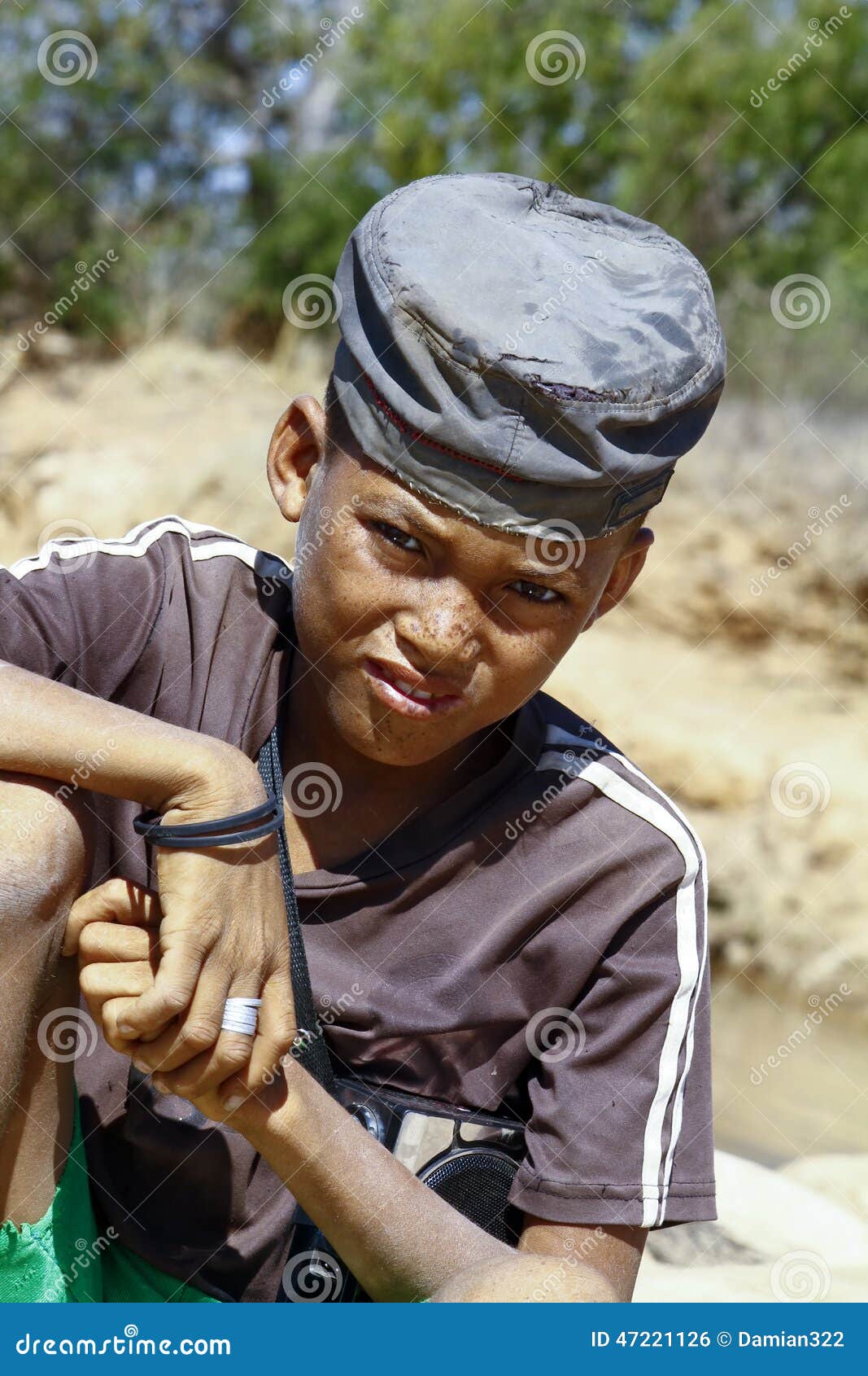 Photo of Adorable Young Happy Boy - African Poor Child Stock Photo ...