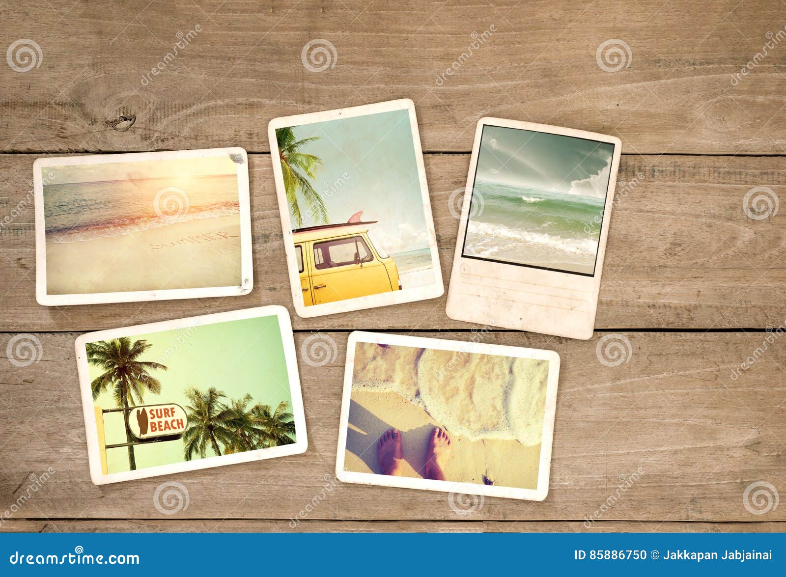 photo album remembrance and nostalgia journey in summer surfing beach trip on wood table.