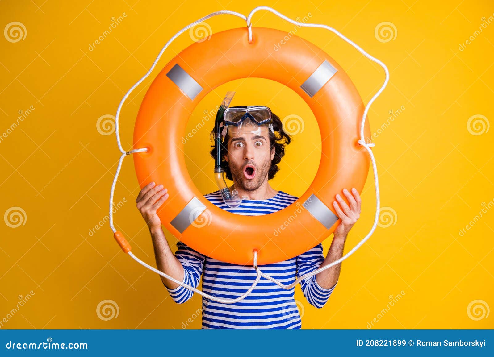 Photo of Amazed Guy in Scuba Goggles Gear Hold Life Buoy Near Face Wear ...