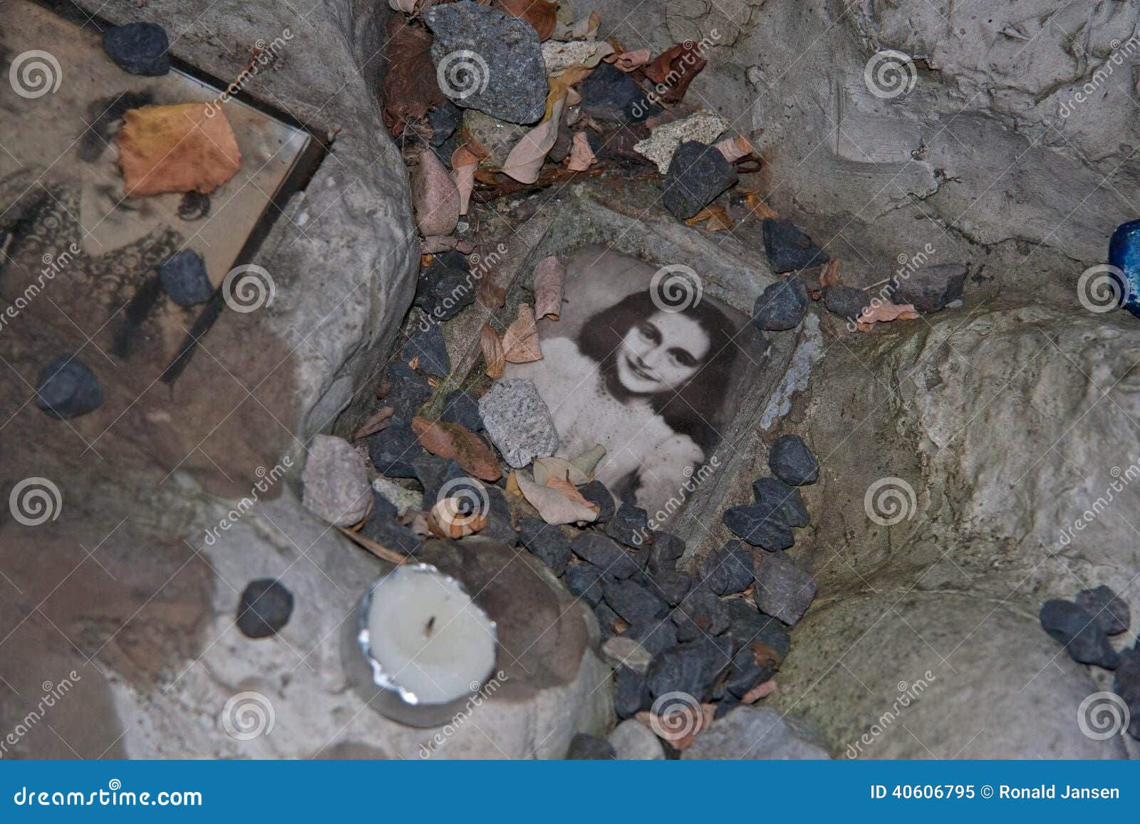 Auschwitz, Poland - November 8, 2008: photo of Anne Frank at the children s memorial at the Jewish cemetery in Warsaw, Poland.