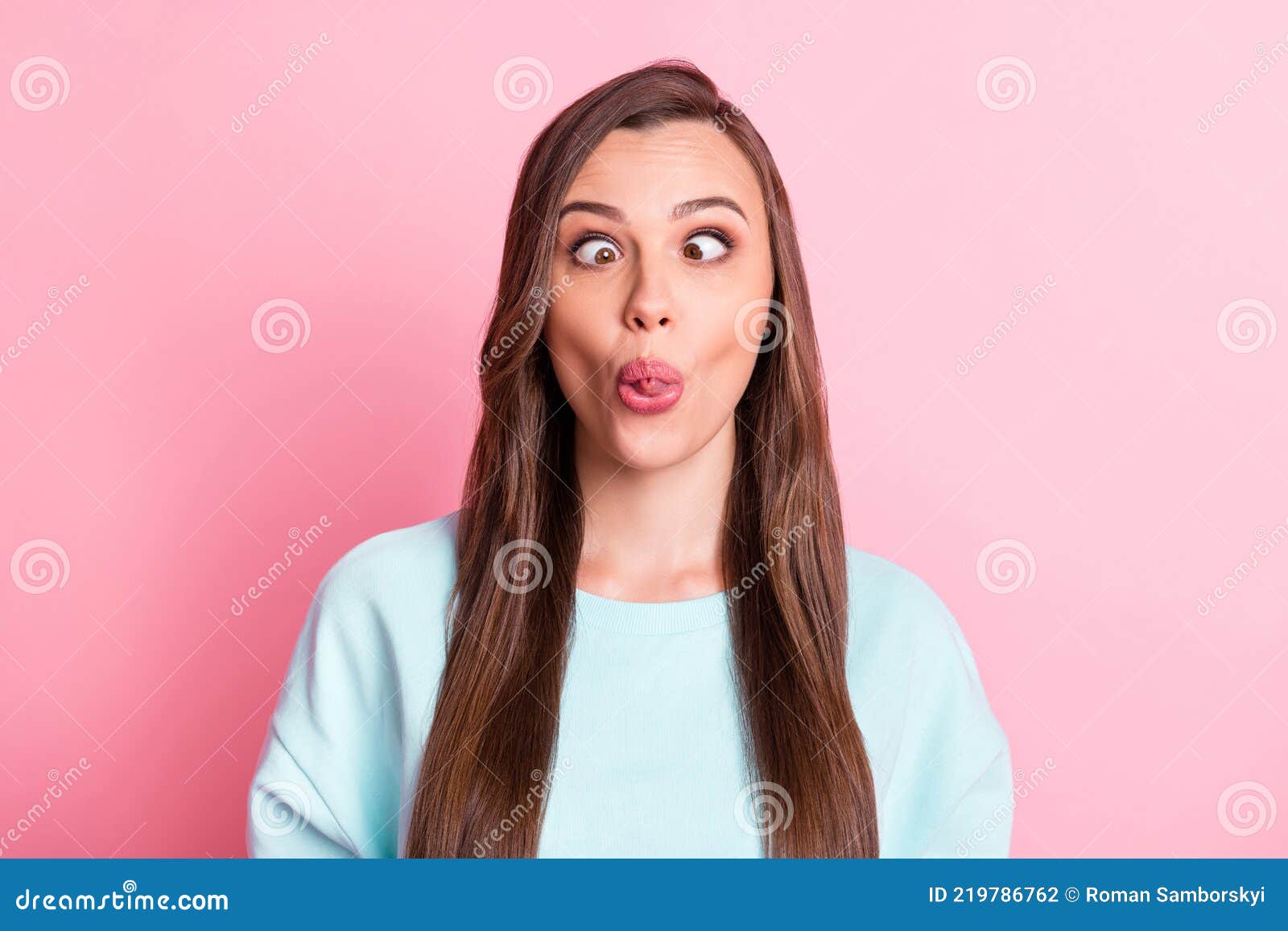 Photo Of Attractive Cheerful Funny Young Lady Make Funky Face Grimace Tongue Out On Pink Color 5101