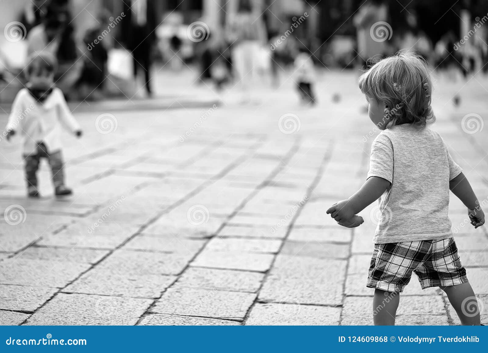 Baby boy playing with girl stock photo. Image of walking - 124609868