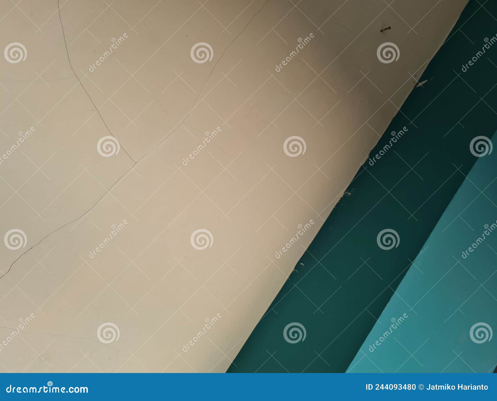 The Background of the Wall is a Combination of Dark Blue and Light Blue