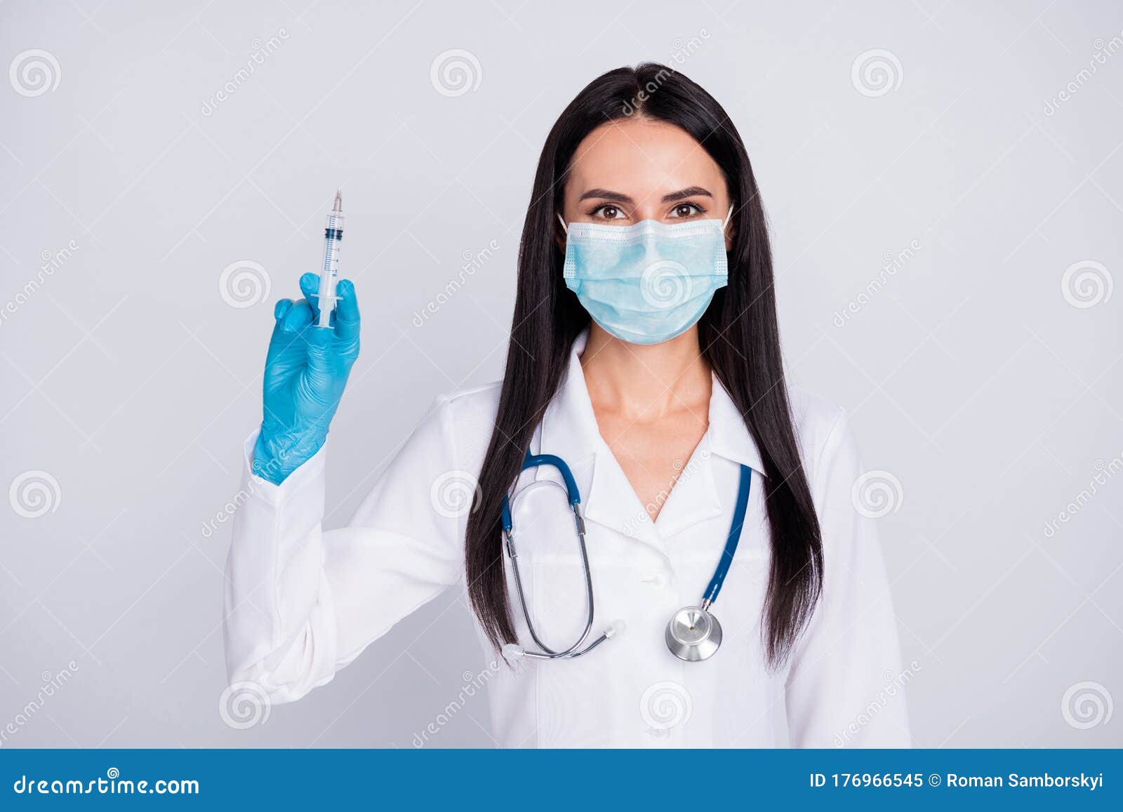 photo of beautiful doc lady ready for operation young professional surgeon hold anesthesia syringe wear mask gloves