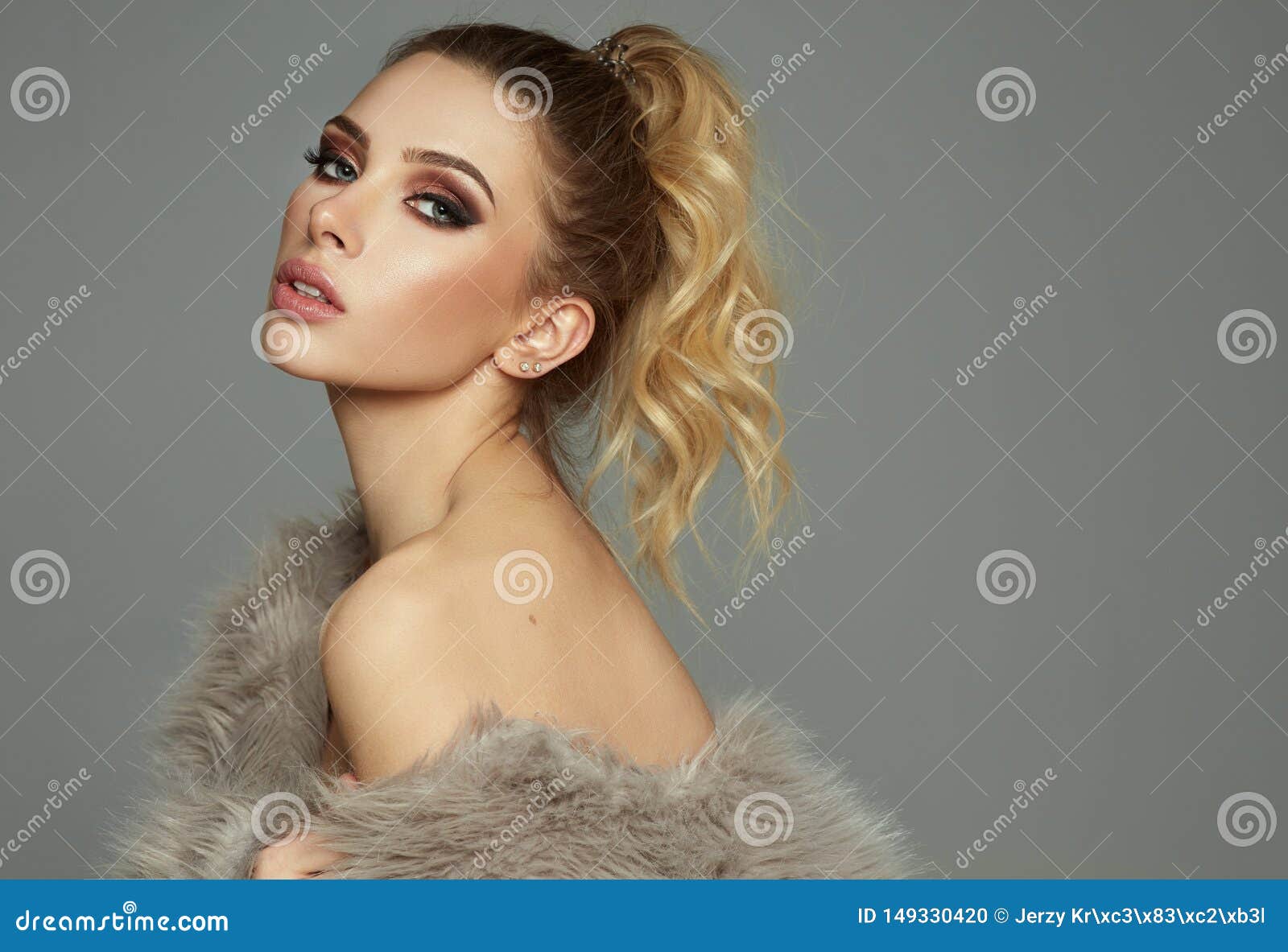 photo of blond female model with faux fur