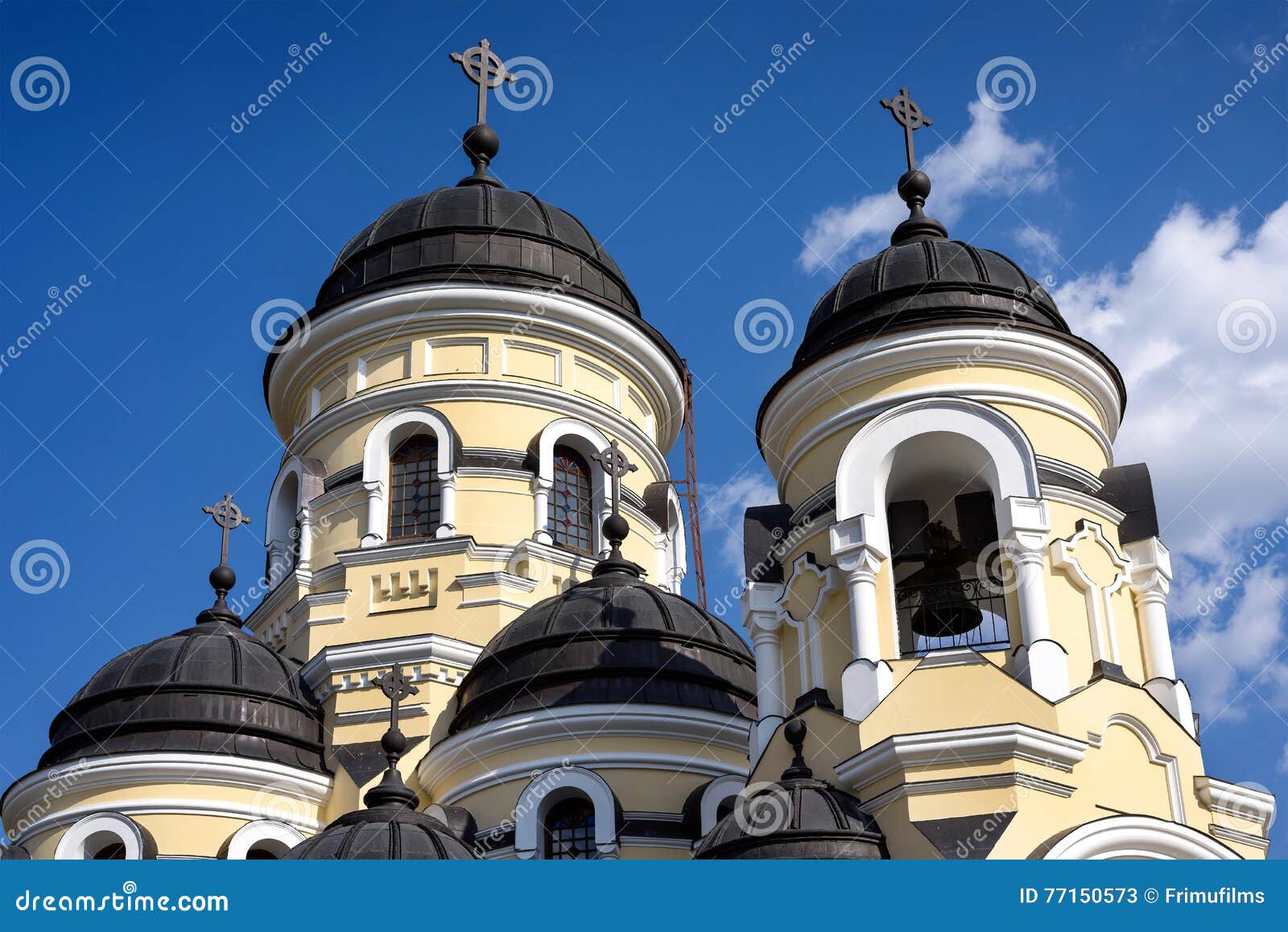 Photo of Capriana Monastery in Moldova with blue sky