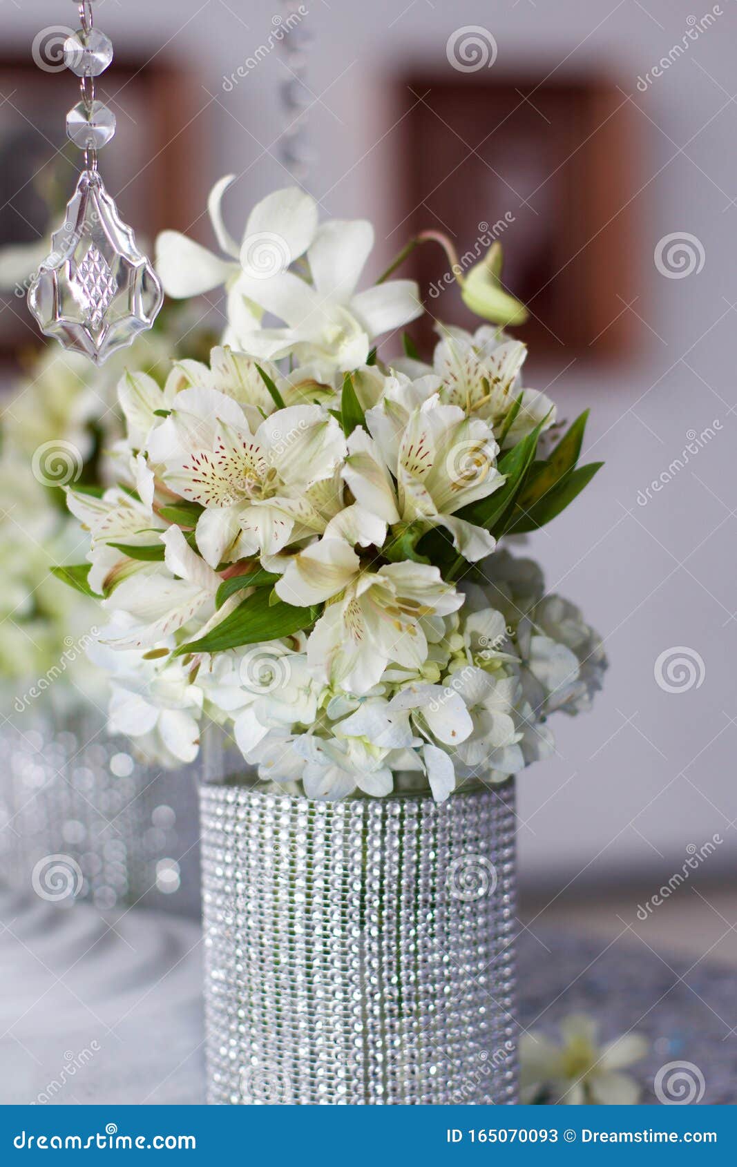 silver centerpiece with flowers