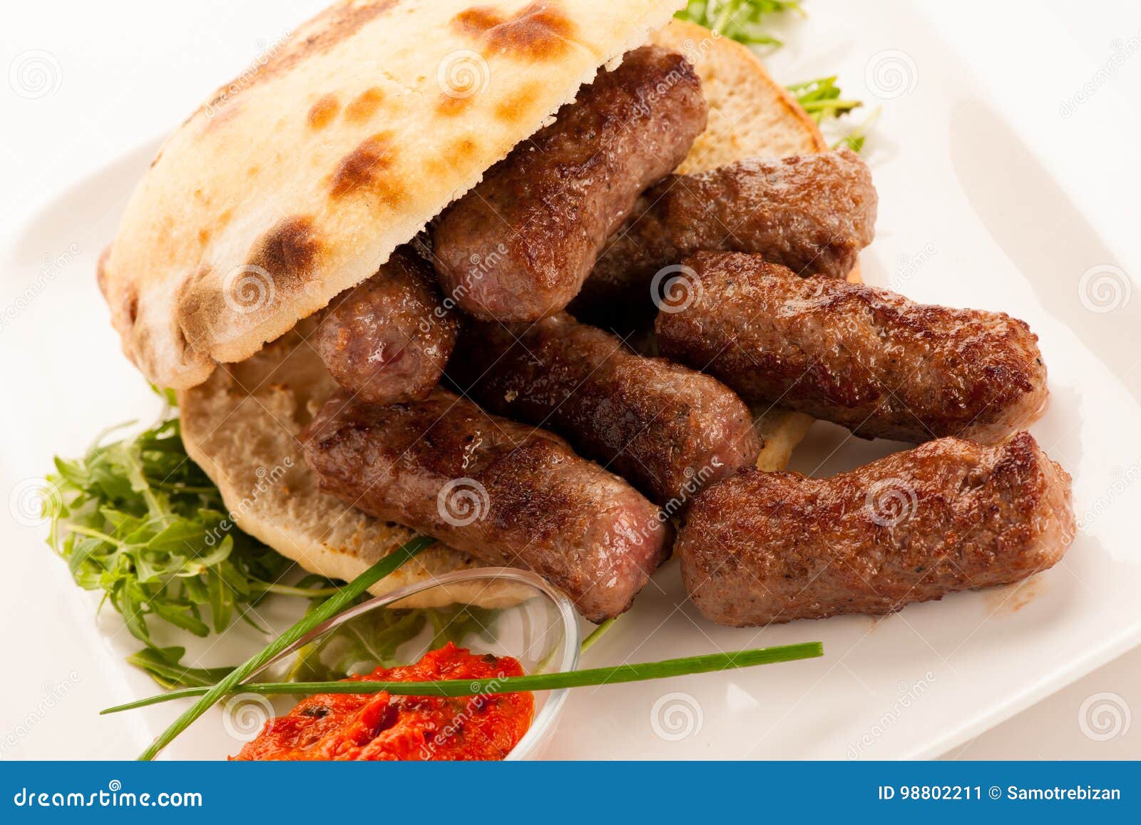 photo of cevapi, cevapcici, traditional balkan food - delicius