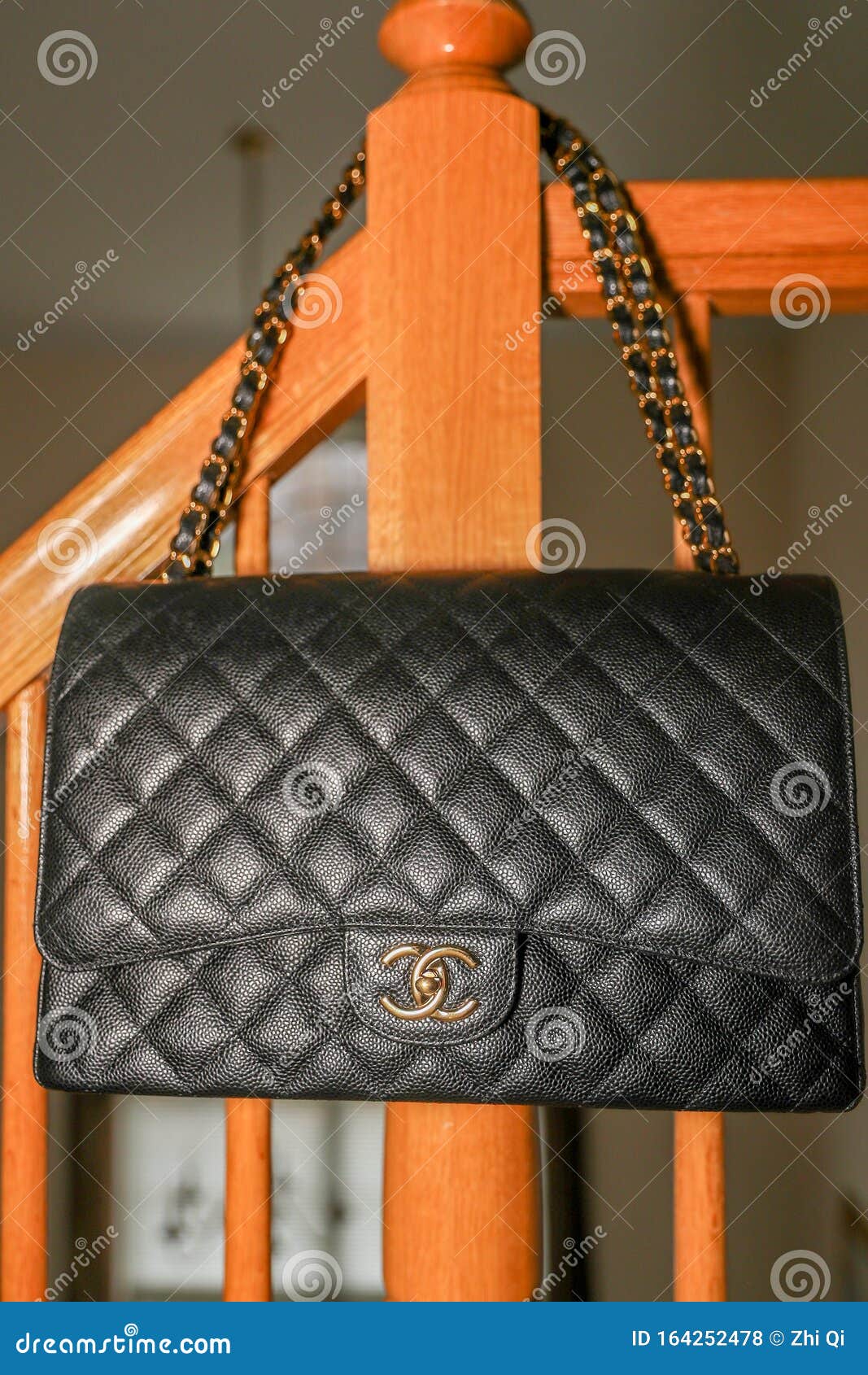 Photo of CHANEL CLASSIC MAXI DOUBLE FLAP Black Handbag Editorial Stock  Photo - Image of beauty, bags: 164252478