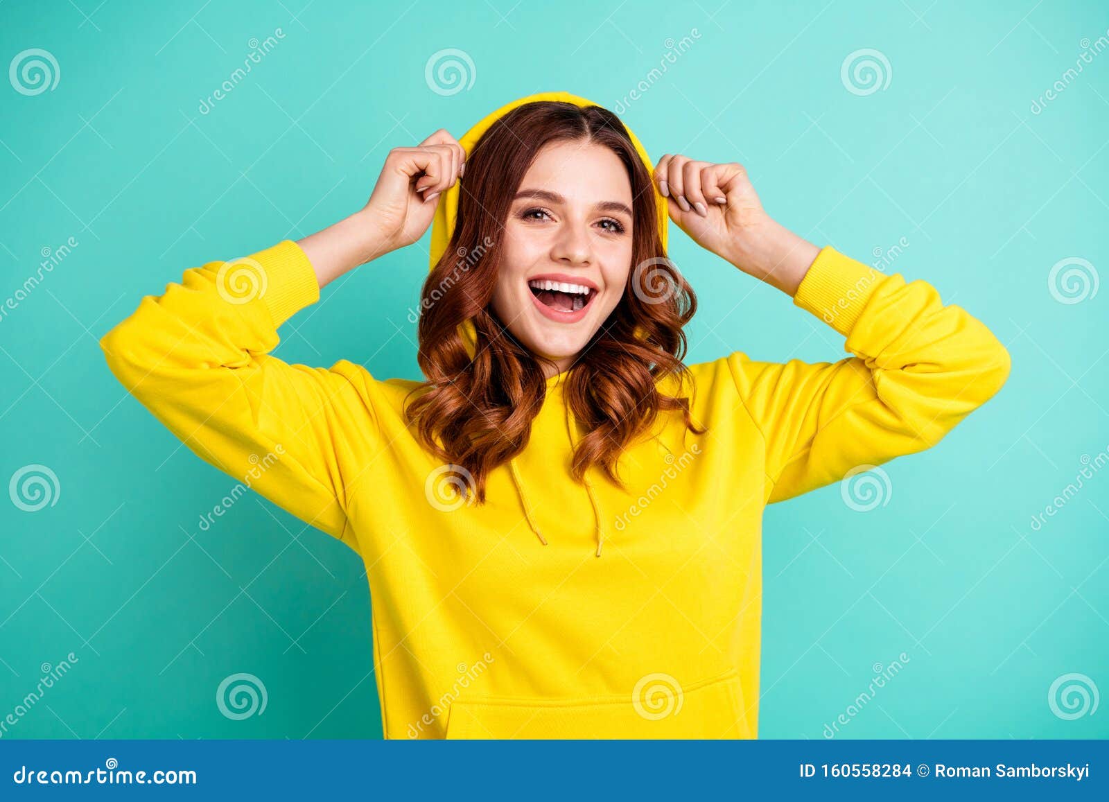 Photo of Cheerful Cute Nice Charming Pretty Sweet Putting Her Hood on ...