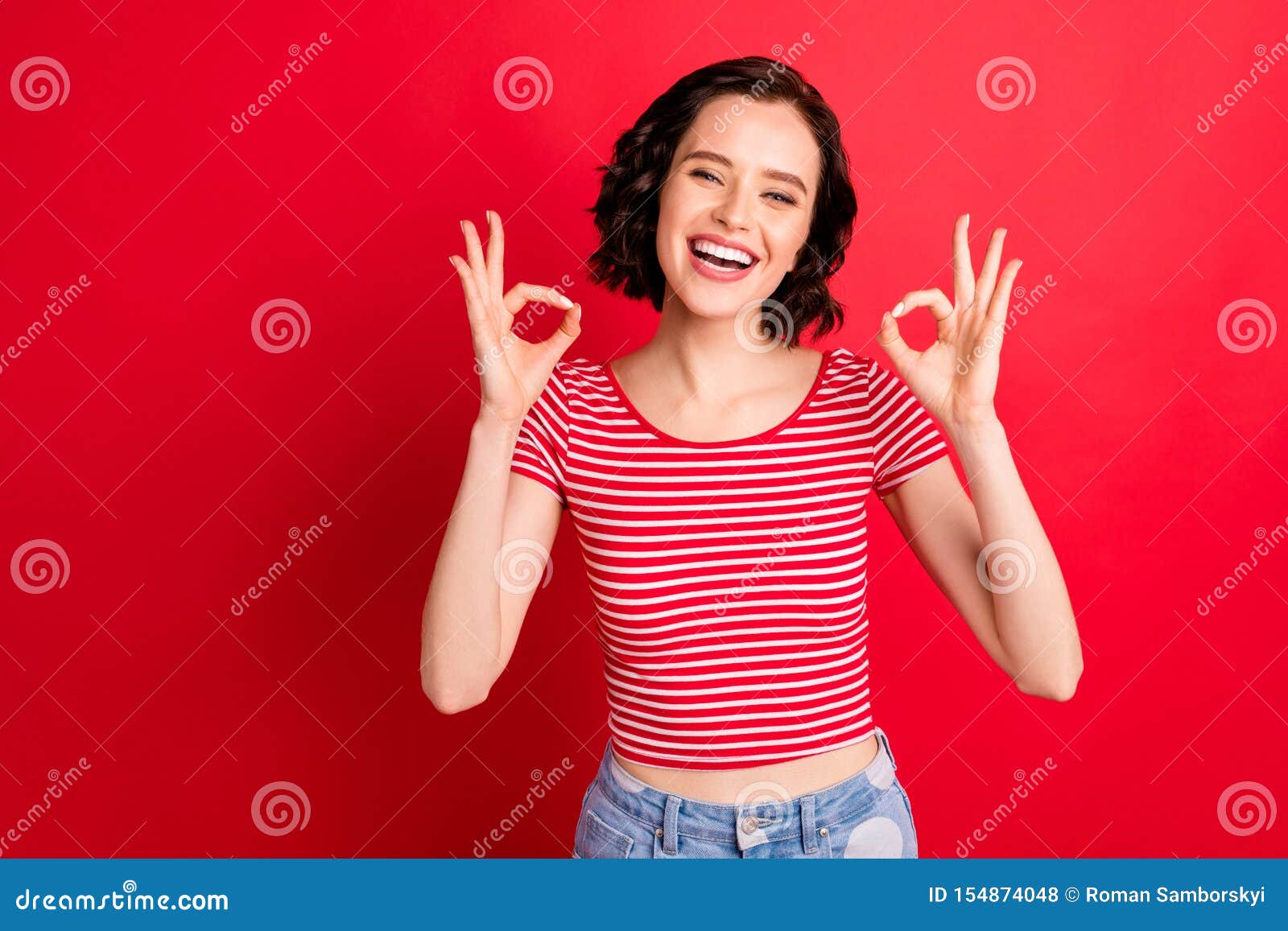 Photo Of Cheerful Enjoying Girlfriend Showing Her Excellent Mood While Isolated With Red