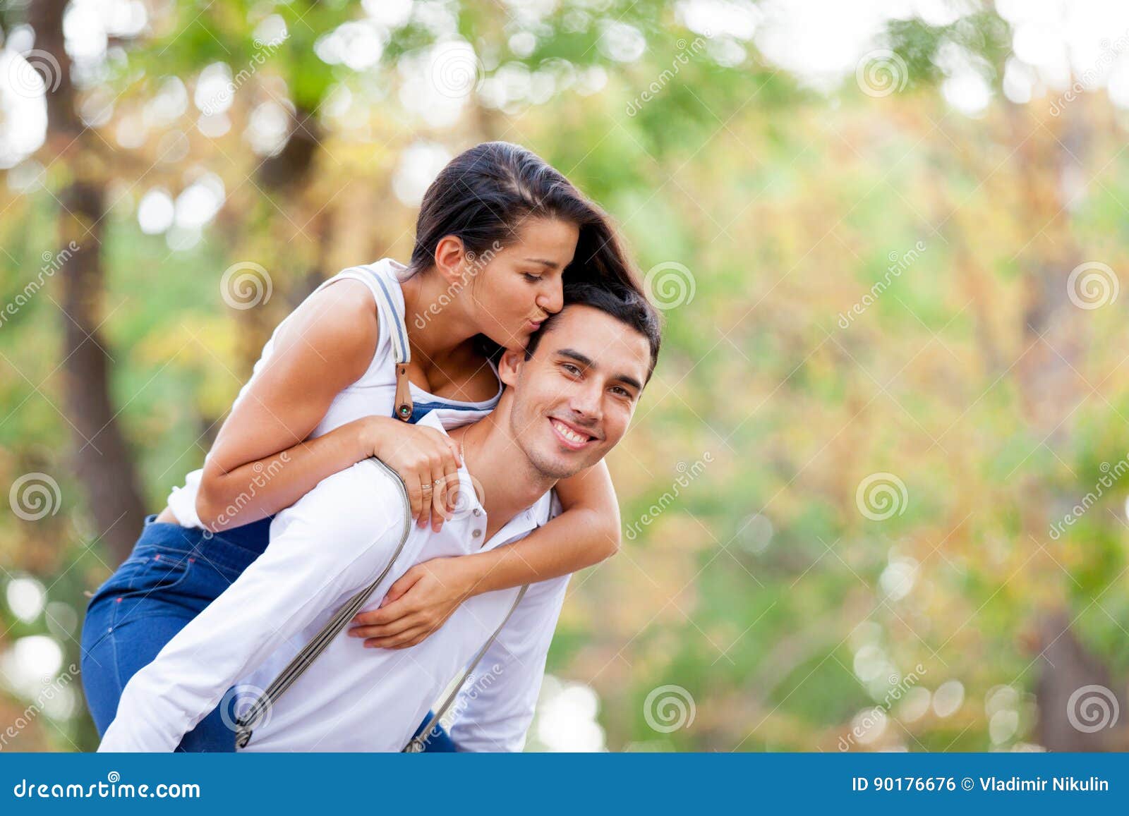 Photo of Cute Couple Hugging and Kissing on the Wonderful Autumn ...