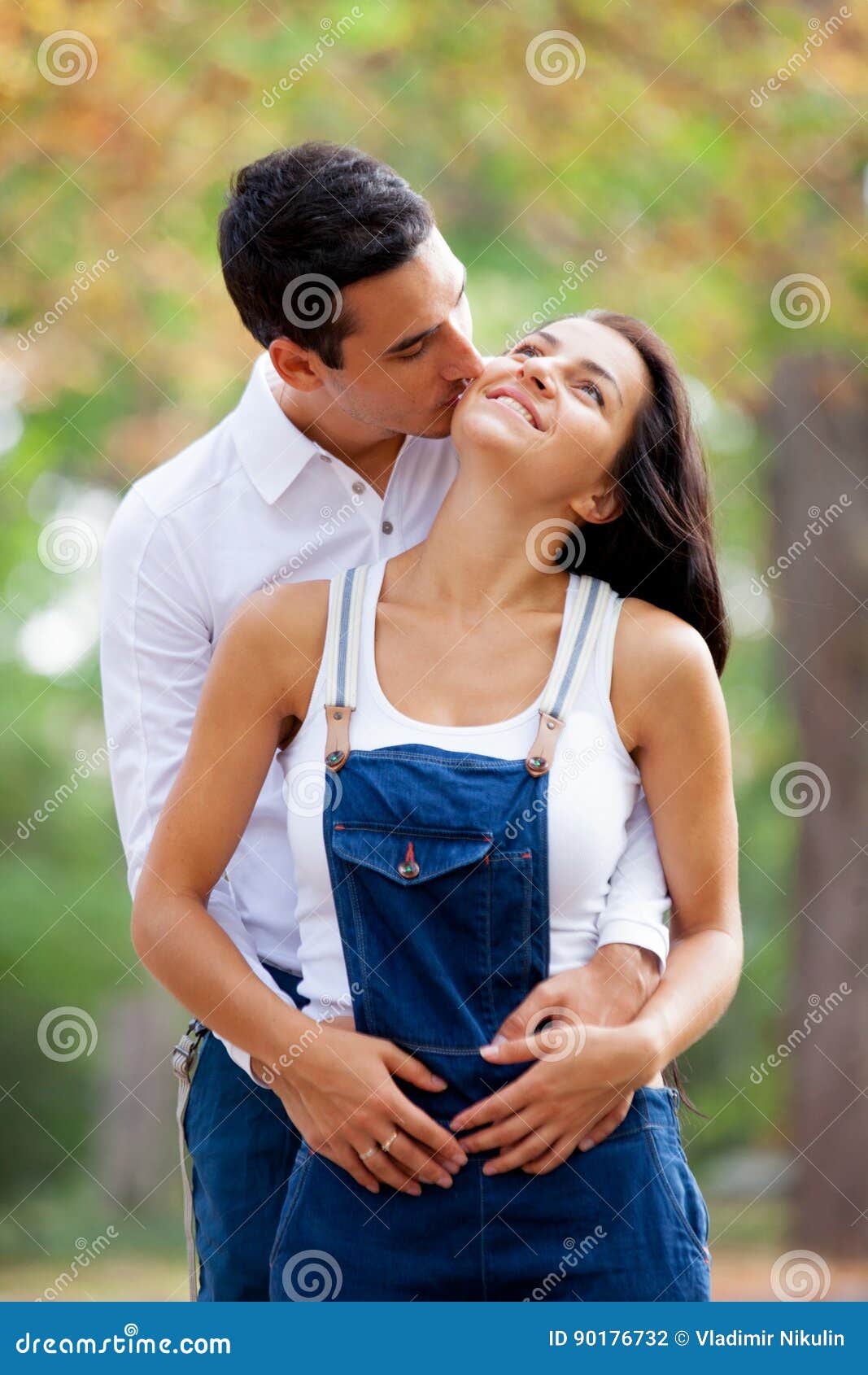 Photo of Cute Couple Hugging on the Wonderful Autumn Park ...