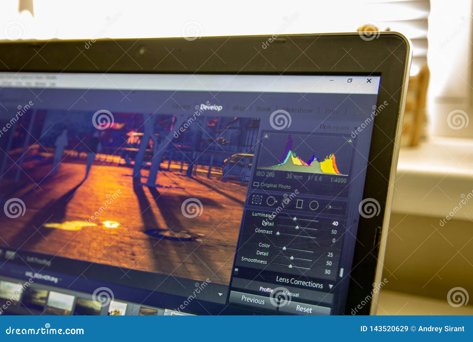 Photo Editing on Laptop. Photographer`s Computer with Professional
