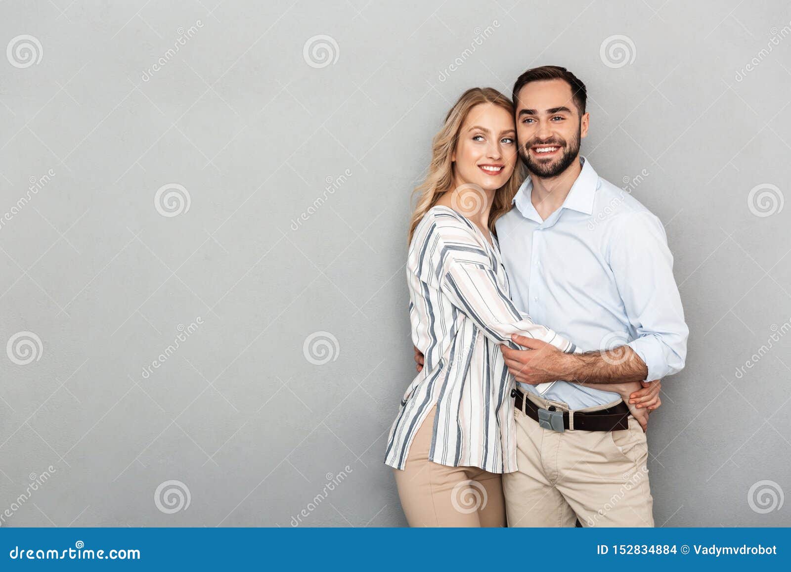 https://thumbs.dreamstime.com/z/photo-european-couple-casual-clothing-smiling-hugging-each-other-isolated-over-gray-background-152834884.jpg