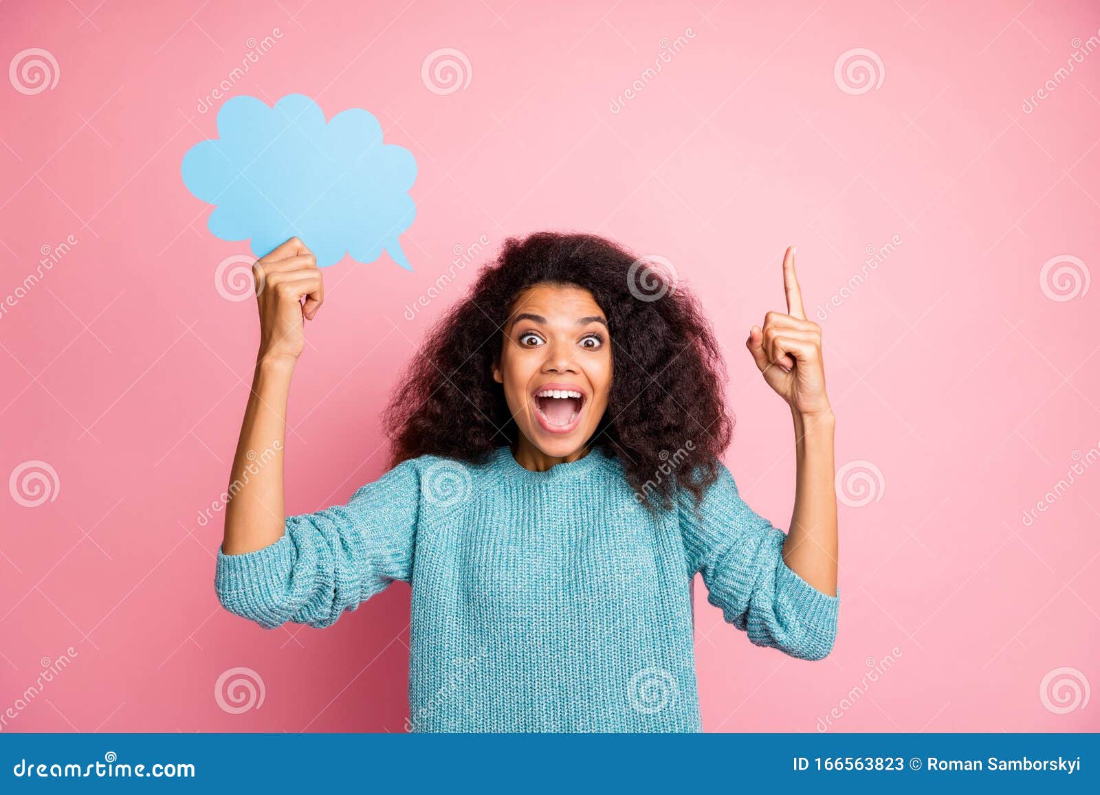 photo of excited cheerful pretty stylish trendy woman in blue jumper overjoyed about having found solution to her