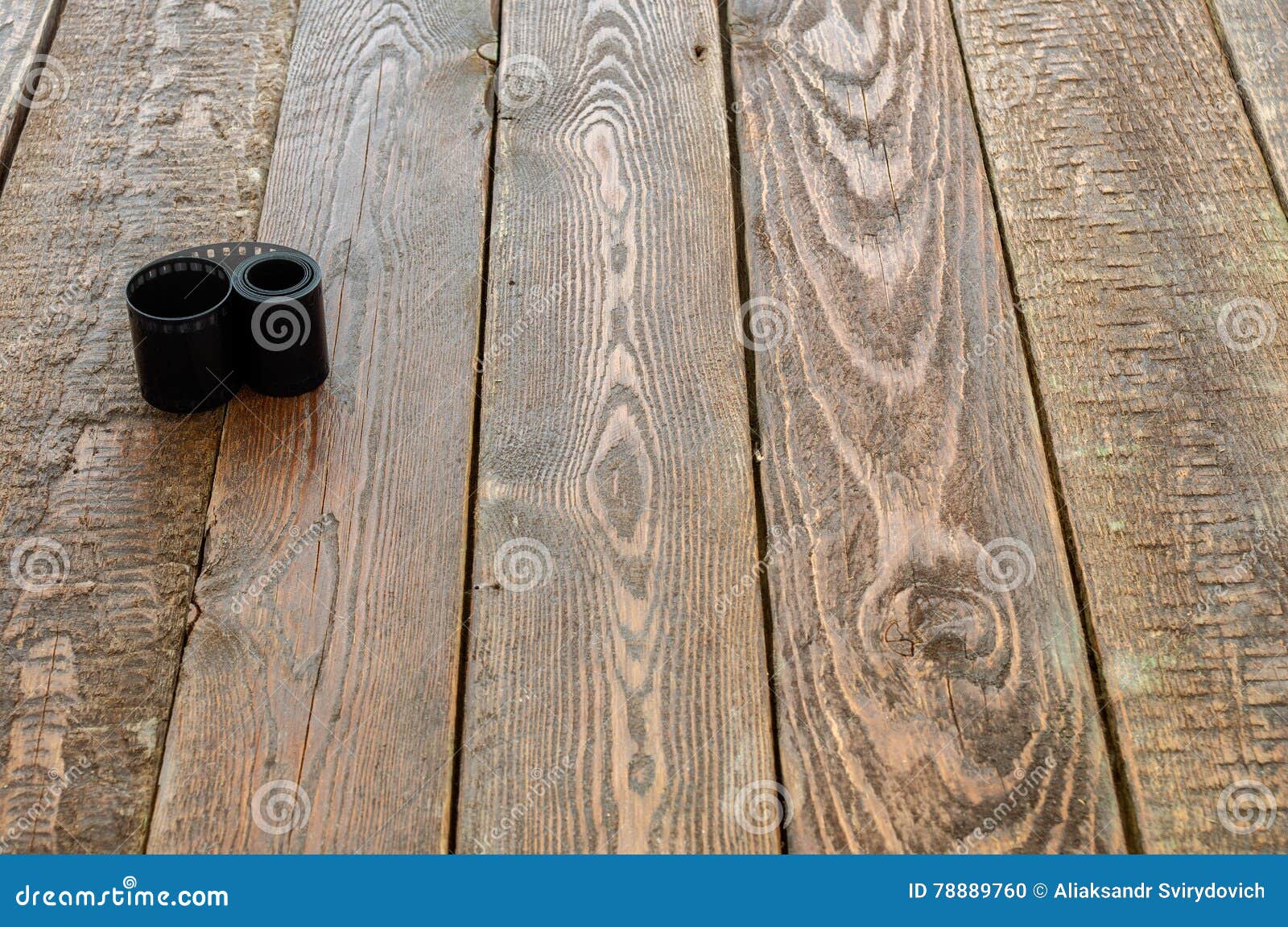 Photo film on wood table stock photo. Image of photograph 78889760