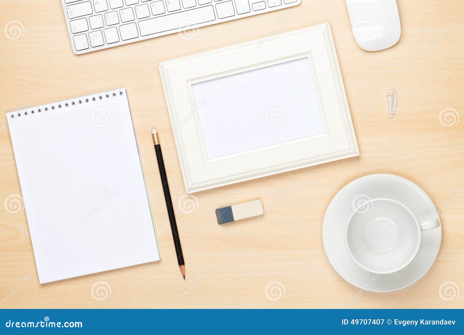 Photo Frame on Office Table with Notepad, Computer and Coffee Cu Stock