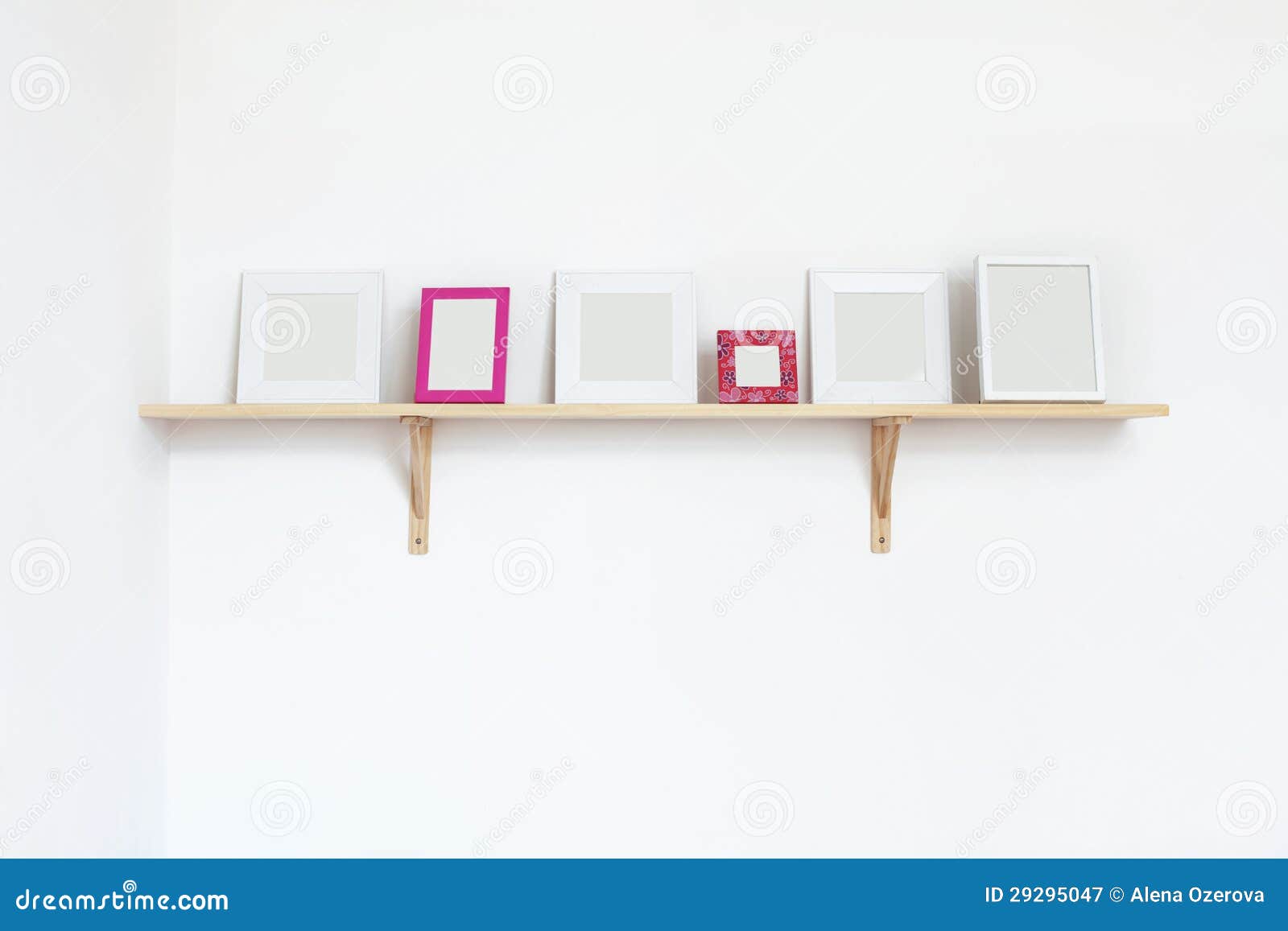 Photo frames on a shelf stock image. Image of modern 29295047