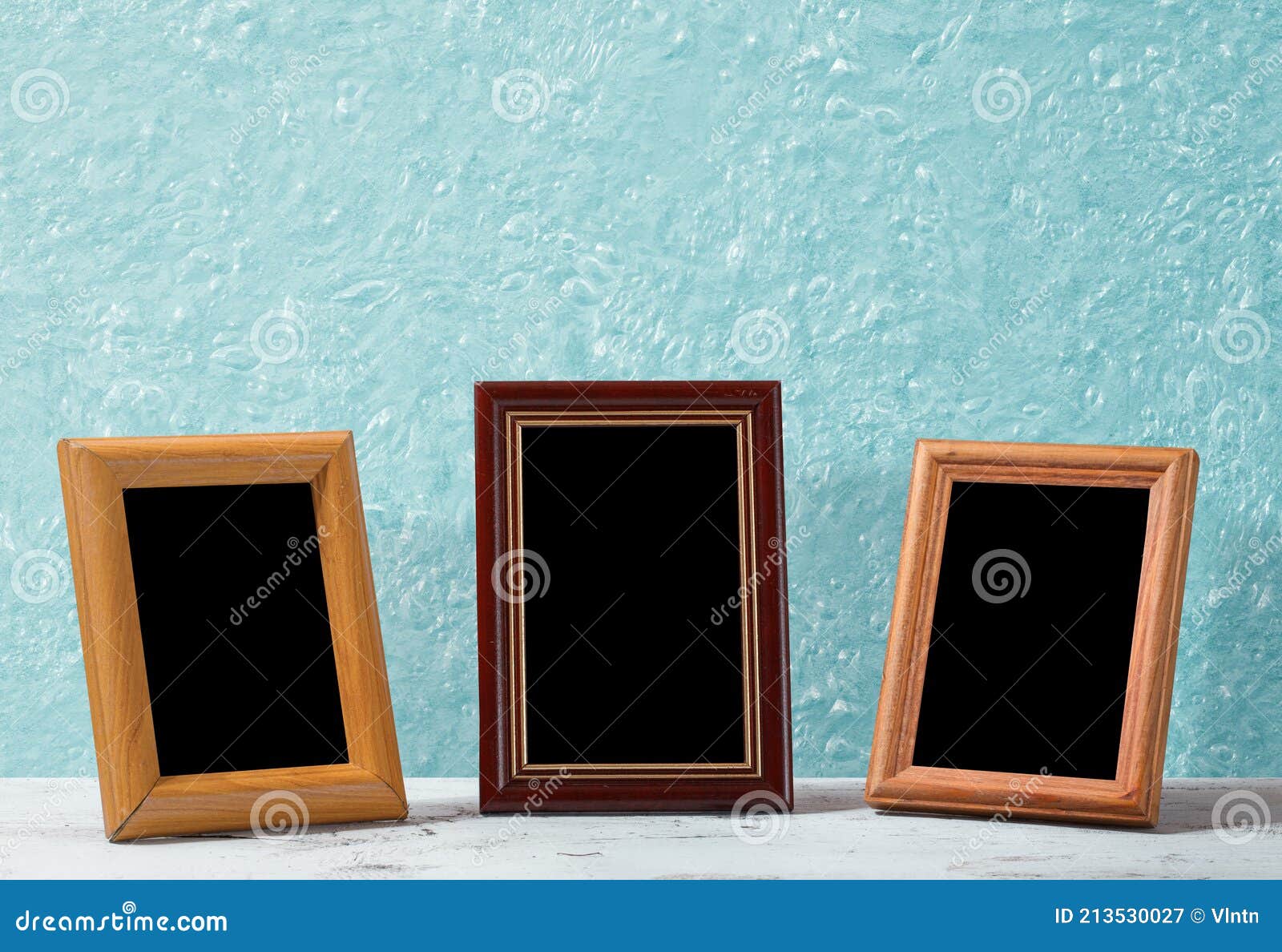 Photo frames on table stock image. Image of decoration 213530027