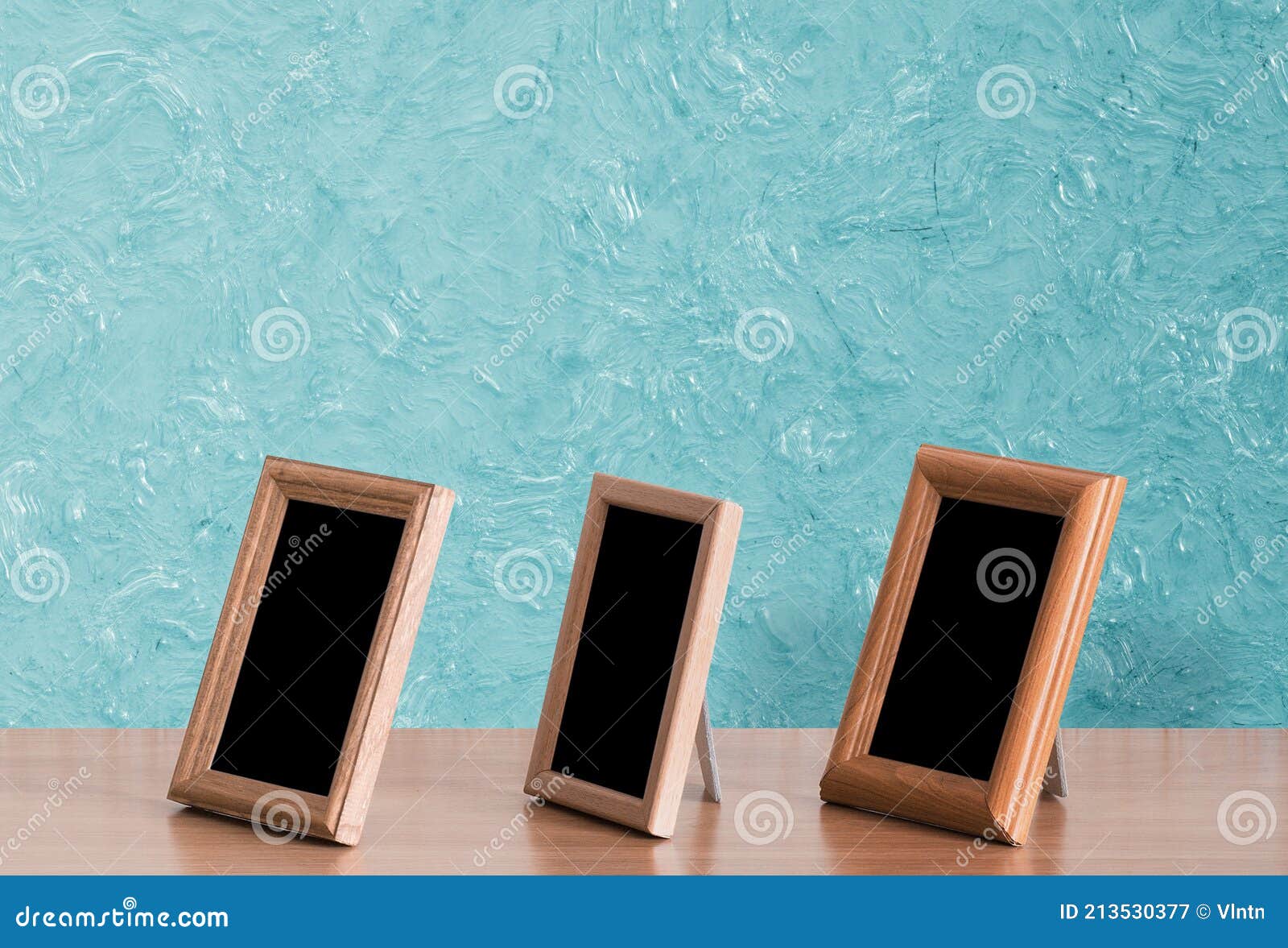 Photo frames on table stock image. Image of gallery 213530377