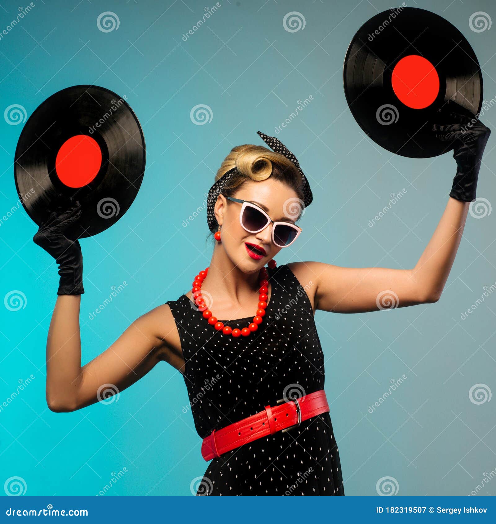 A Photo Of Glamorous Pin Up Girl Holding Vinyl Lp In Hand Stock Image