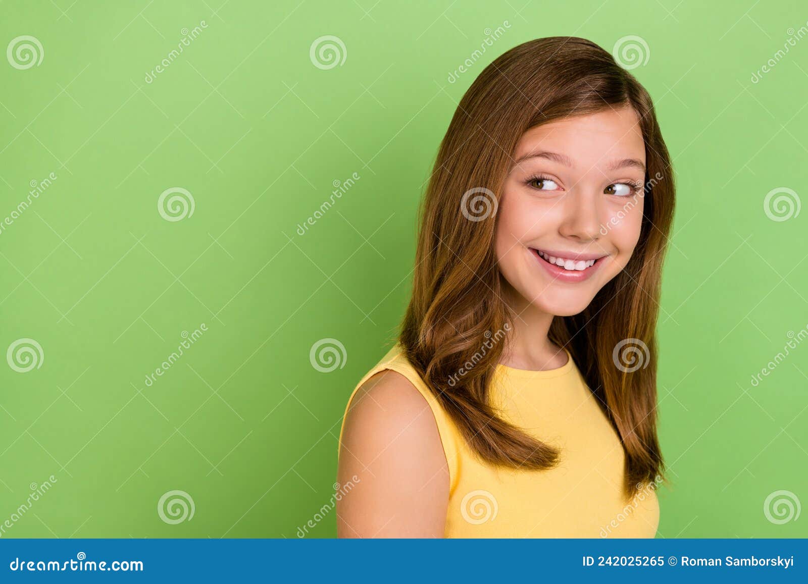 photo of good mood cheerful sweet lady look empty space interested wondering  on green color background
