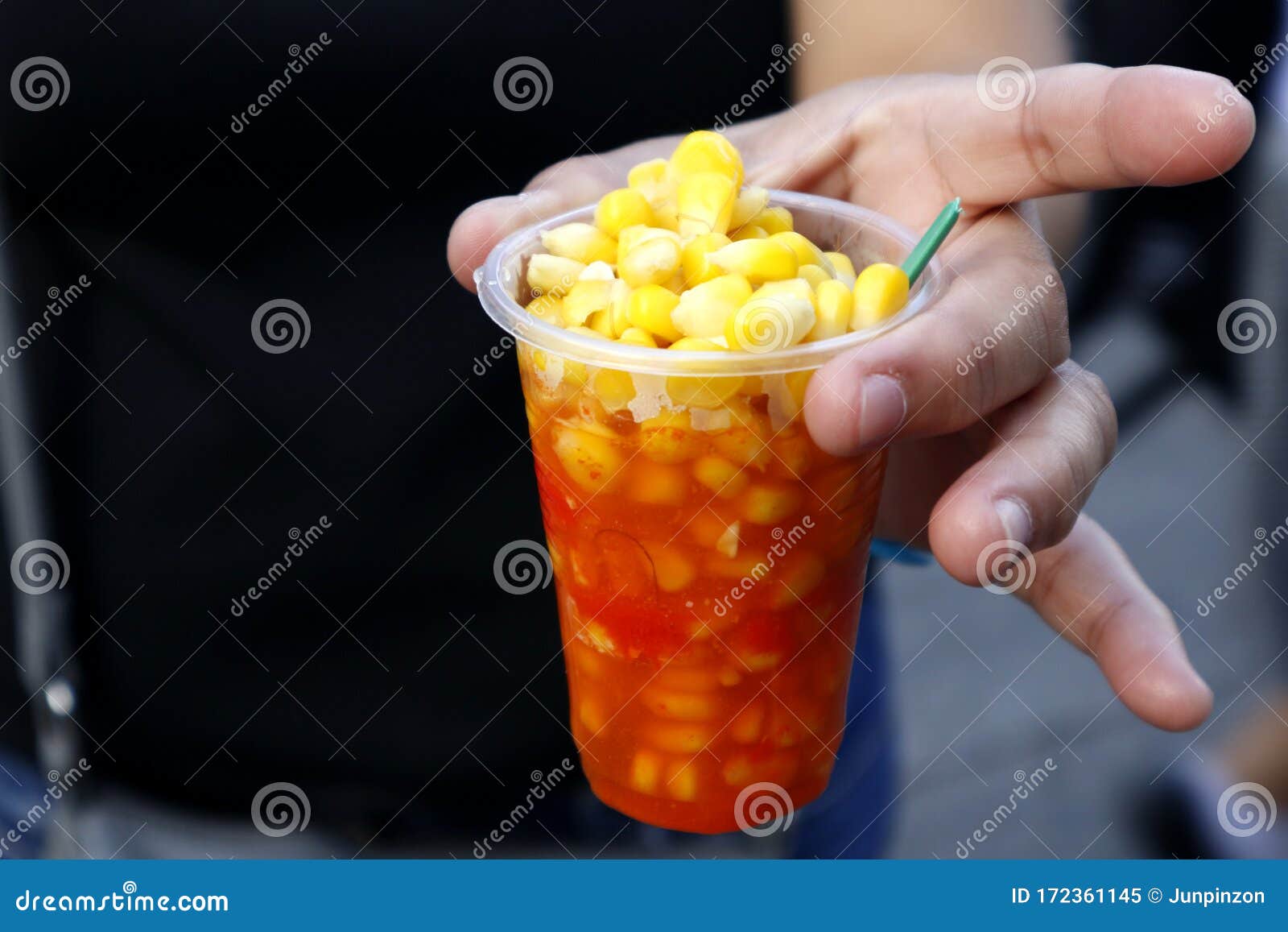 Hand Holding a Steamed Corn with Cheese in a Plastic Cup Stock Image Image of human, taste