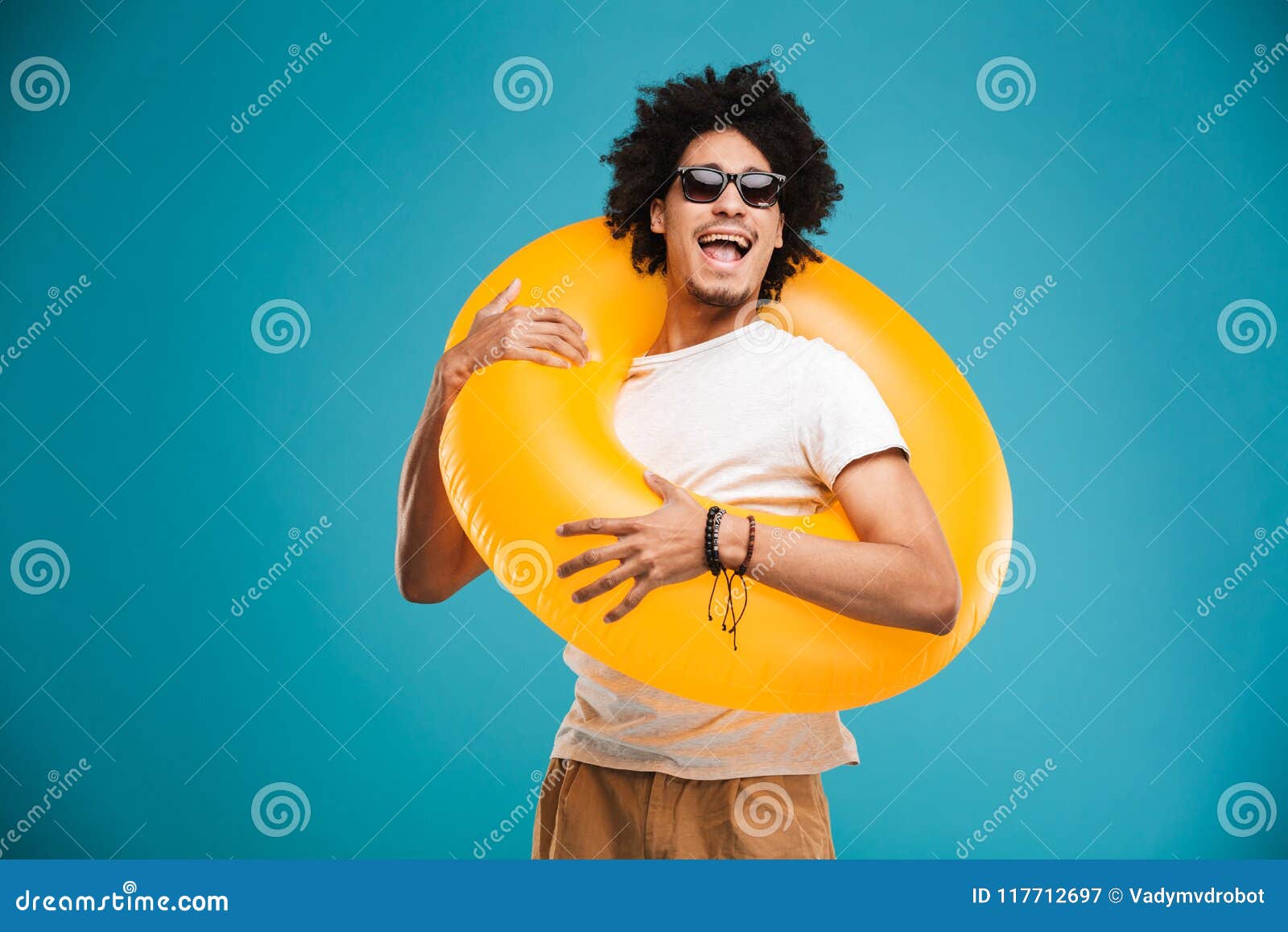 Handsome Young African Curly Man Holding Rubber Ring. Stock Image ...