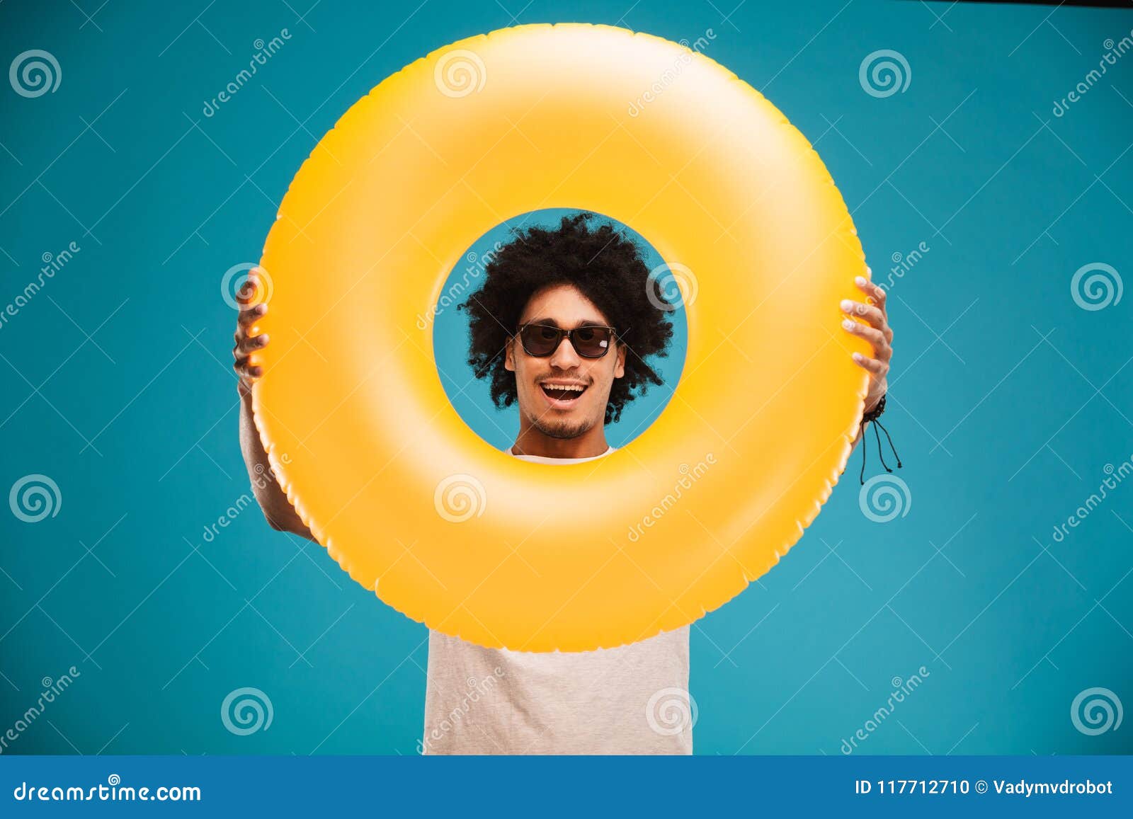 Handsome Young African Curly Man Holding Rubber Ring. Stock Photo ...