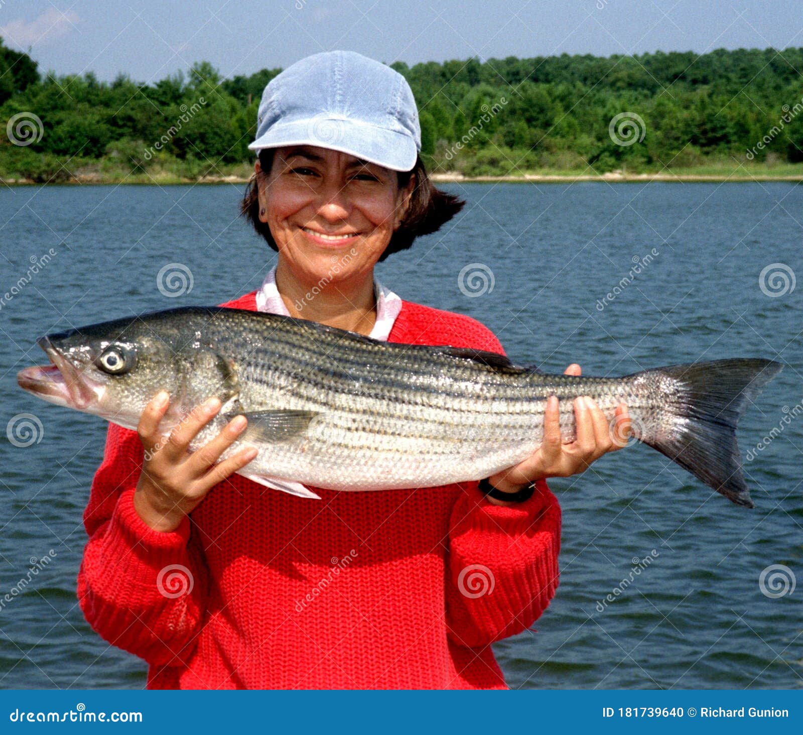 woman with 10 lb striped bass