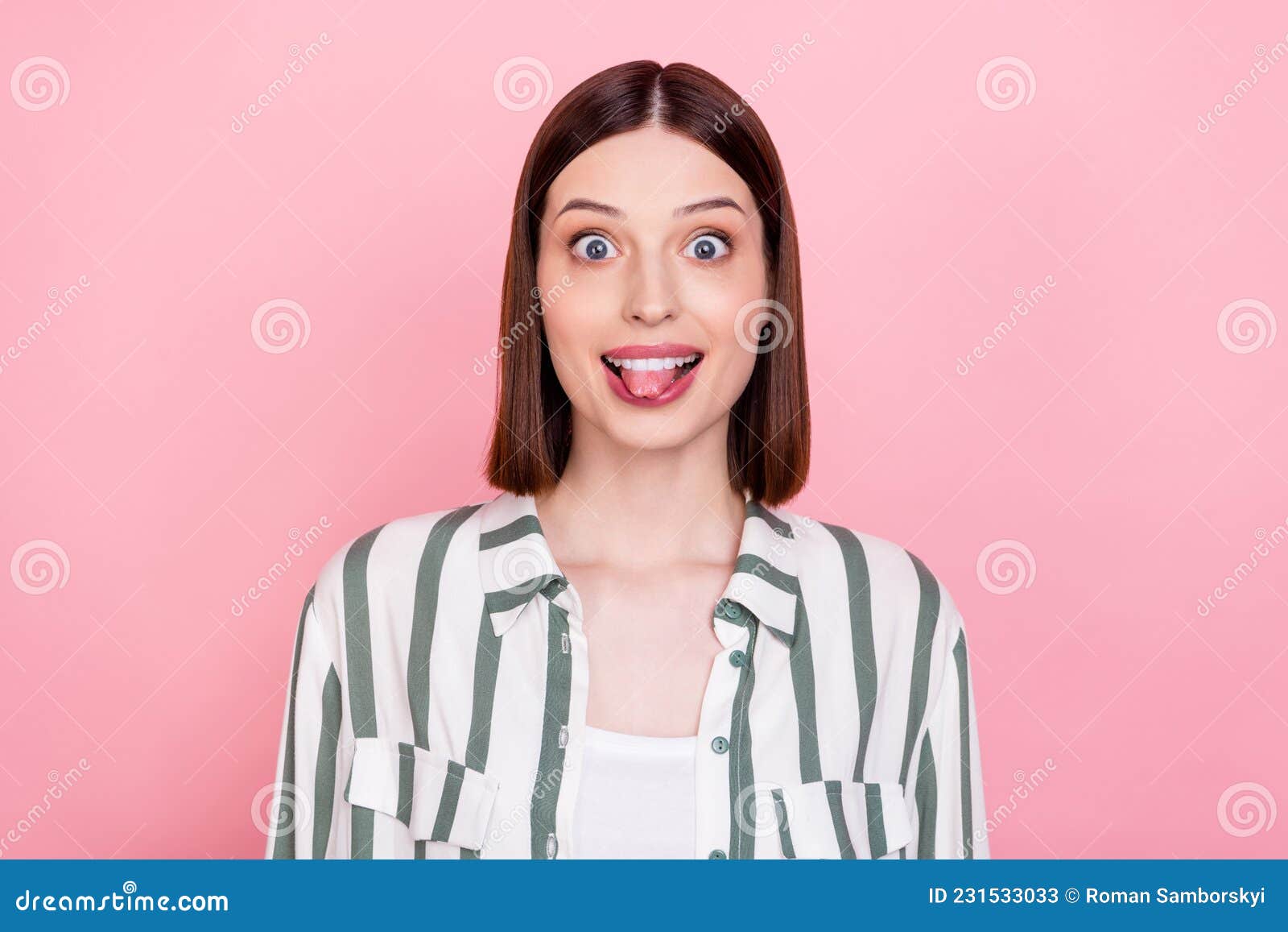 Photo Of Lovely Brunette Lady Tongue Out Wear White Shirt Isolated On Pink Color Background 