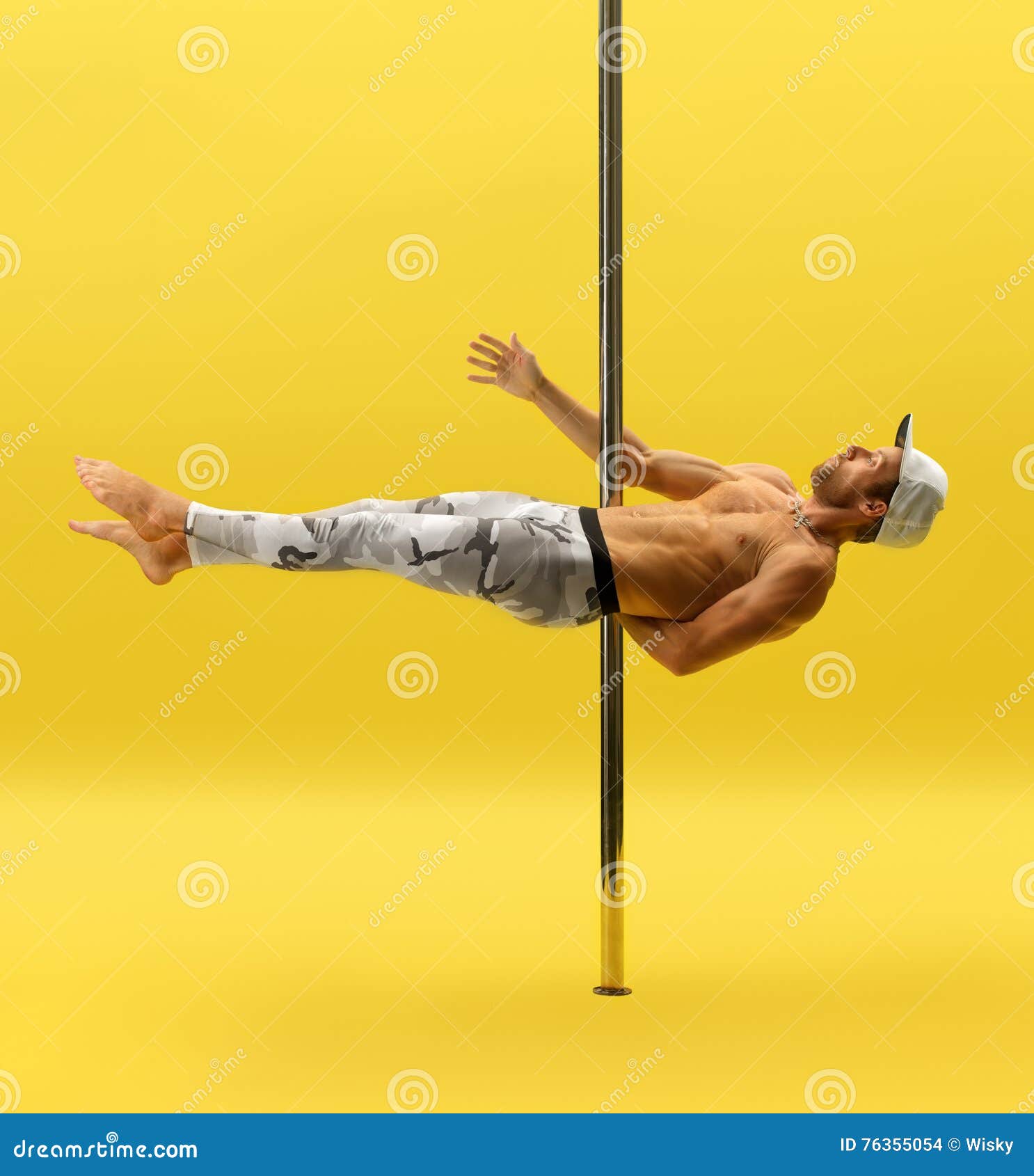 Photo of Modern Male Dancer Performing on Pylon Stock Photo Image of