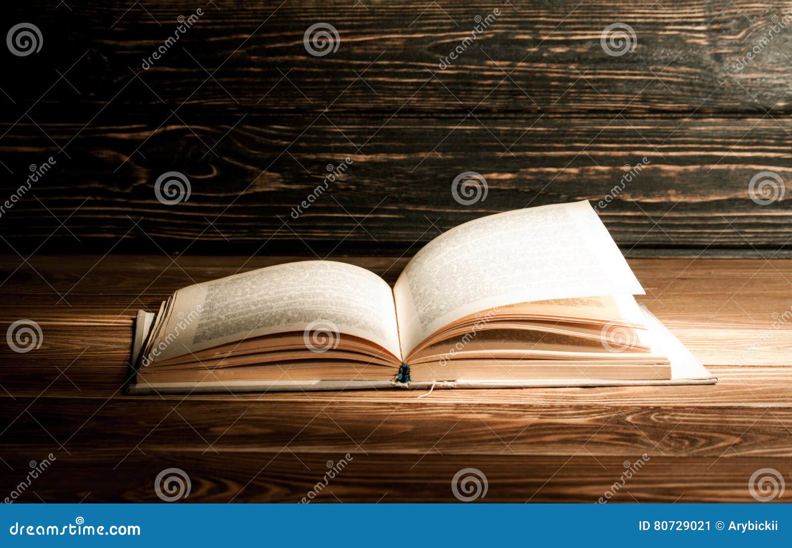 Photo Open Book on the Boards. a Ray of Light Stock Image Image of