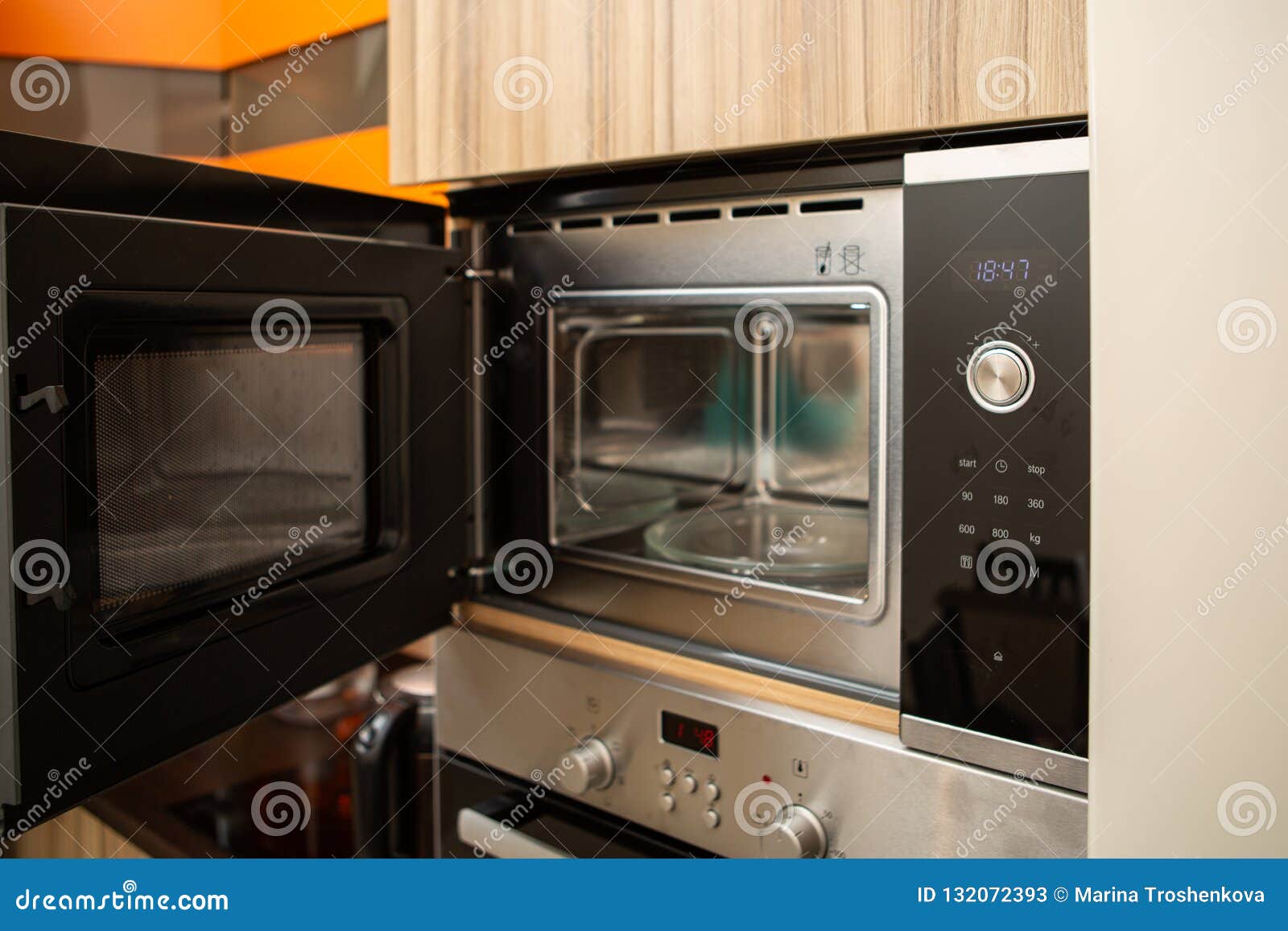 Photo of Open Microwave in Kitchen Stock Image Image of modern