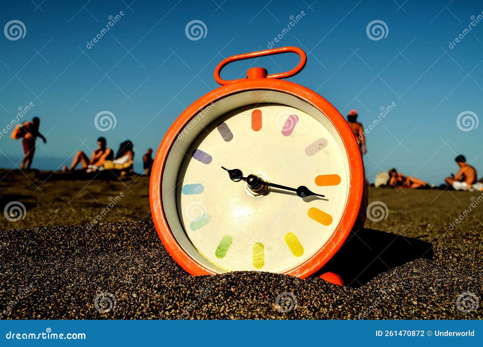 Clock on the Sand Beach stock photo. Image of idea, alarm 261470872