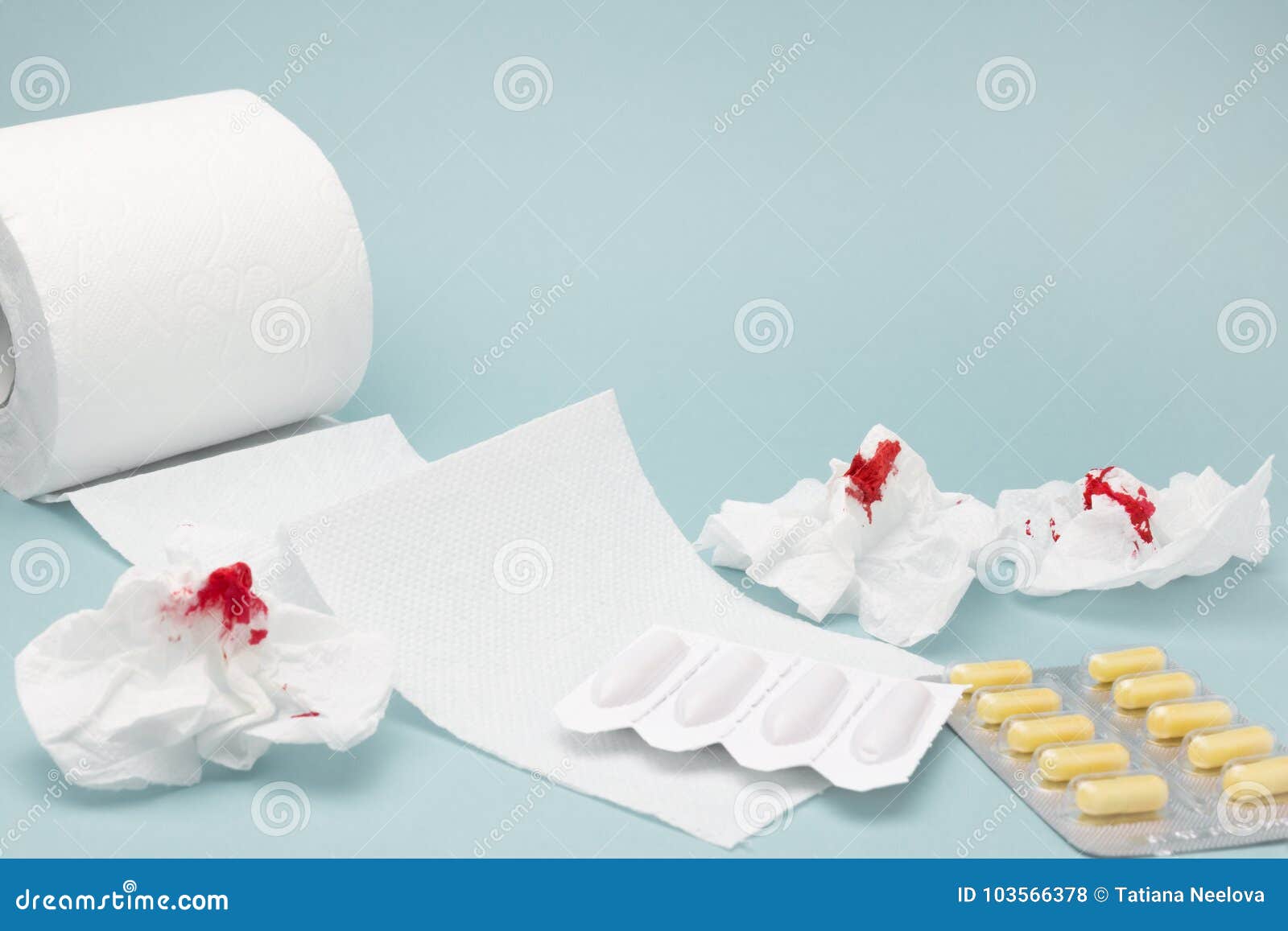 A Photo Of Pills Used Bloody Toilet Paper Sheets Rectal Candles And A