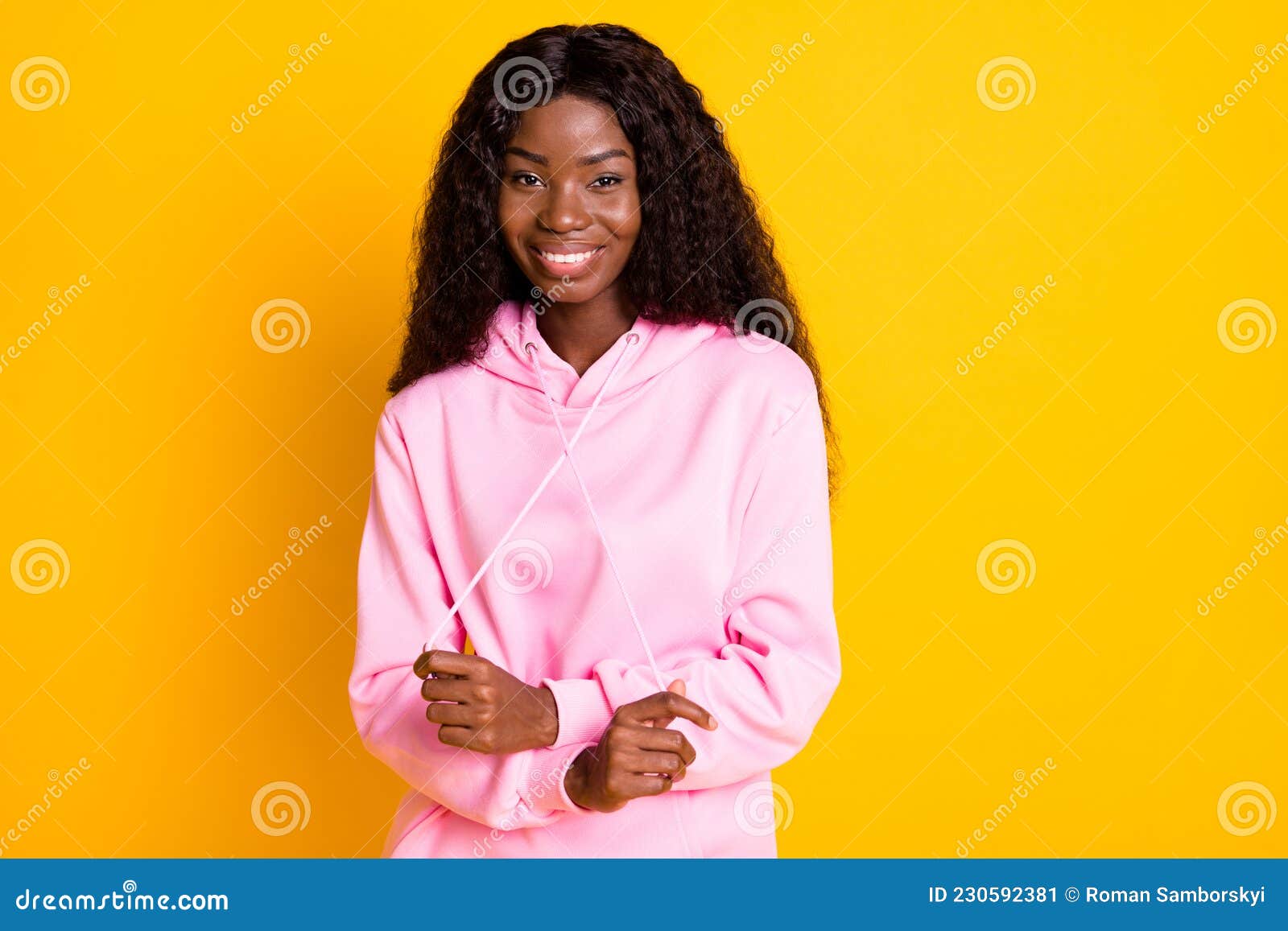 Photo Portrait of African American Girl Pulling Hoodie Strings Laces  Isolated on Vivid Yellow Colored Background Stock Image - Image of black,  multiethnic: 230592381