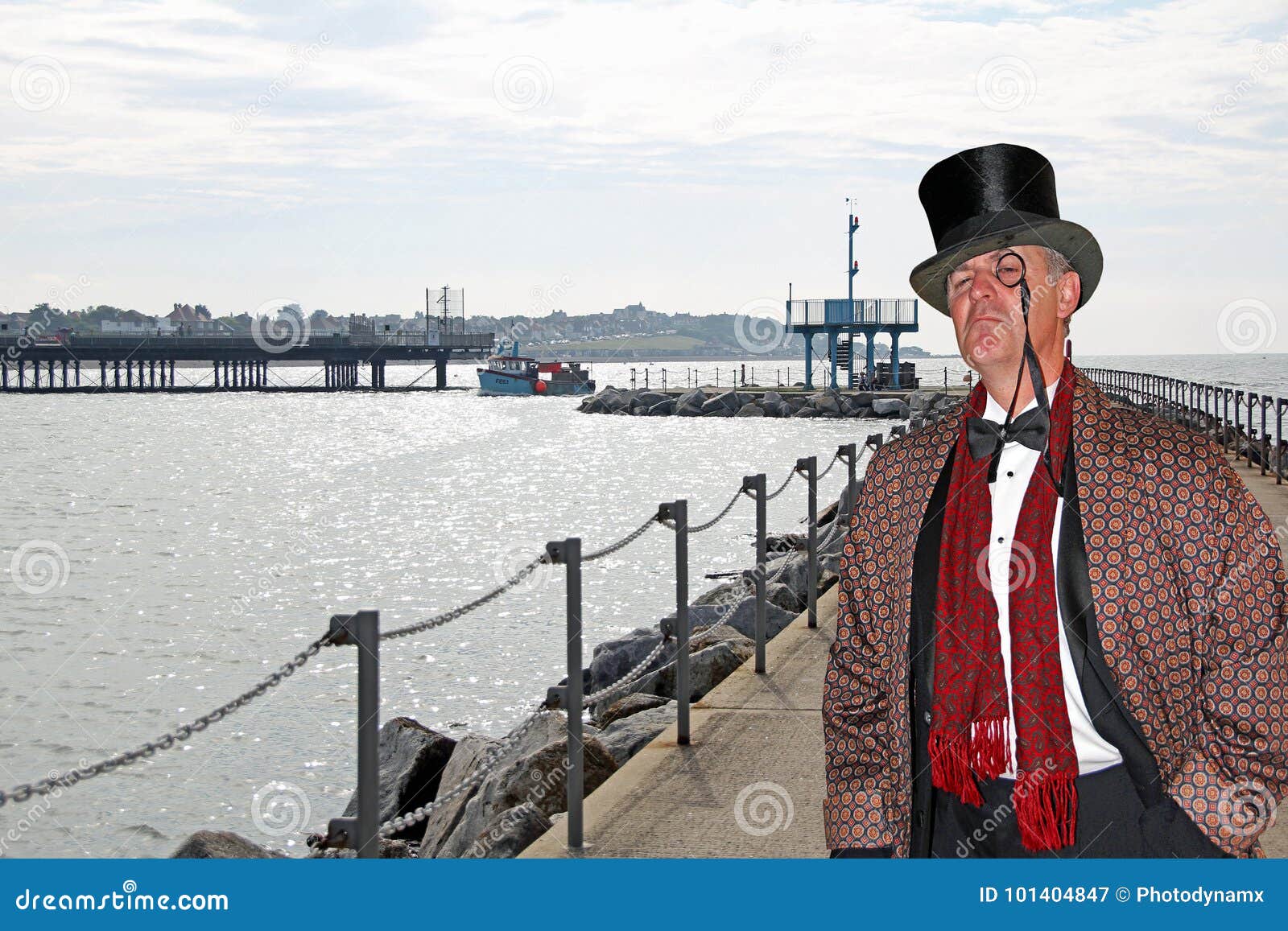 posh city gent on bridge pier neptunes arm herne bay kent top hat