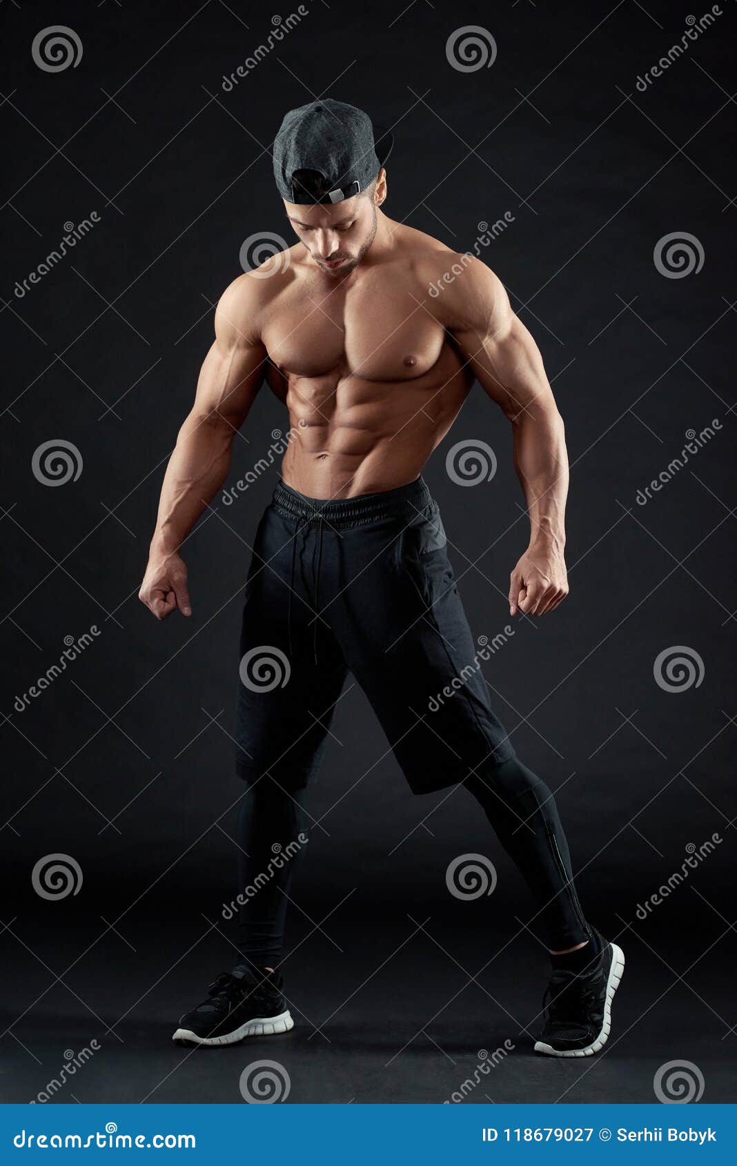 View Of A Muscled Man On A Black Background In Artistic, Fitness And Bodybuilding  Poses. Stock Photo, Picture and Royalty Free Image. Image 17489185.