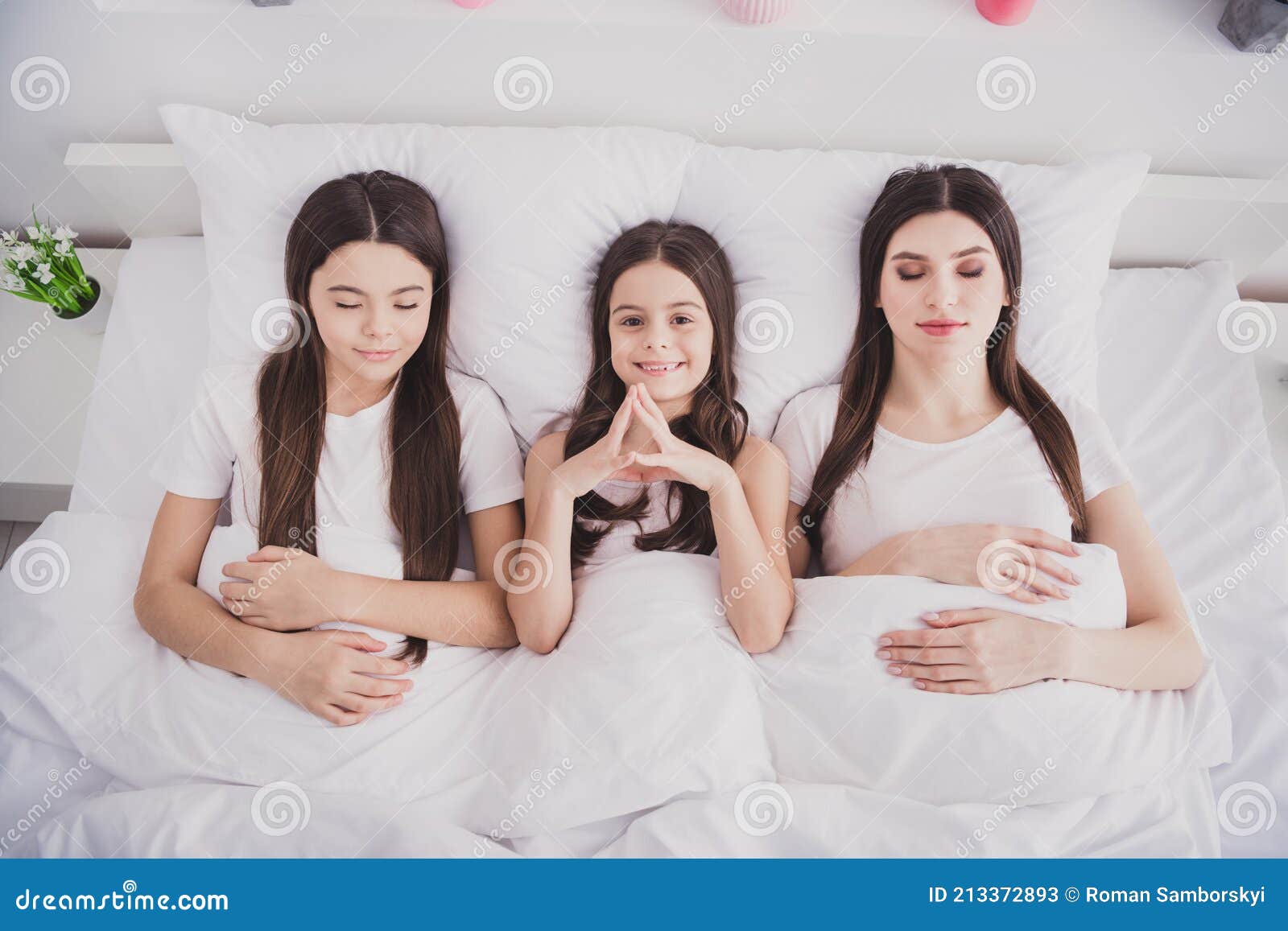 Photo of Pretty Funny Three Sisters Sleepwear Lying Bed Having Rest Closed  Eyes Inside Indoors Home Room Stock Image - Image of funny, girl: 213372893